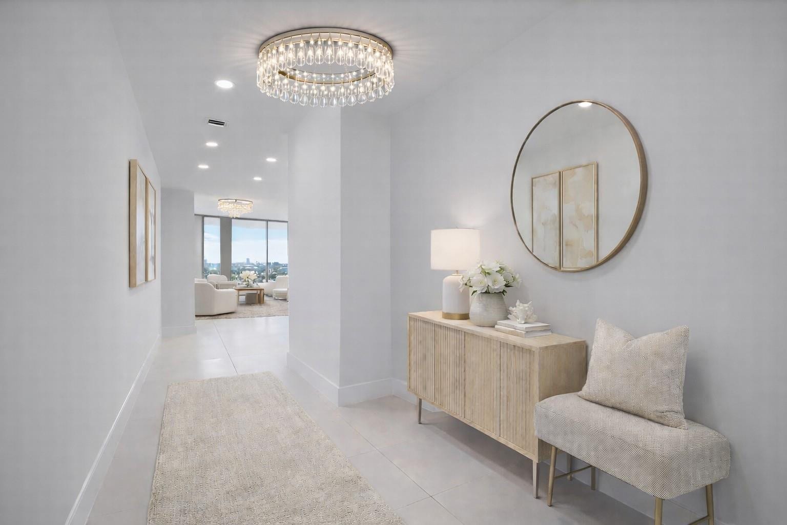 153 N Seabreeze Boulevard N, #1803, Fort Lauderdale, FL 33304 The entryway of the condo, chandelier not included. Virtually staged.