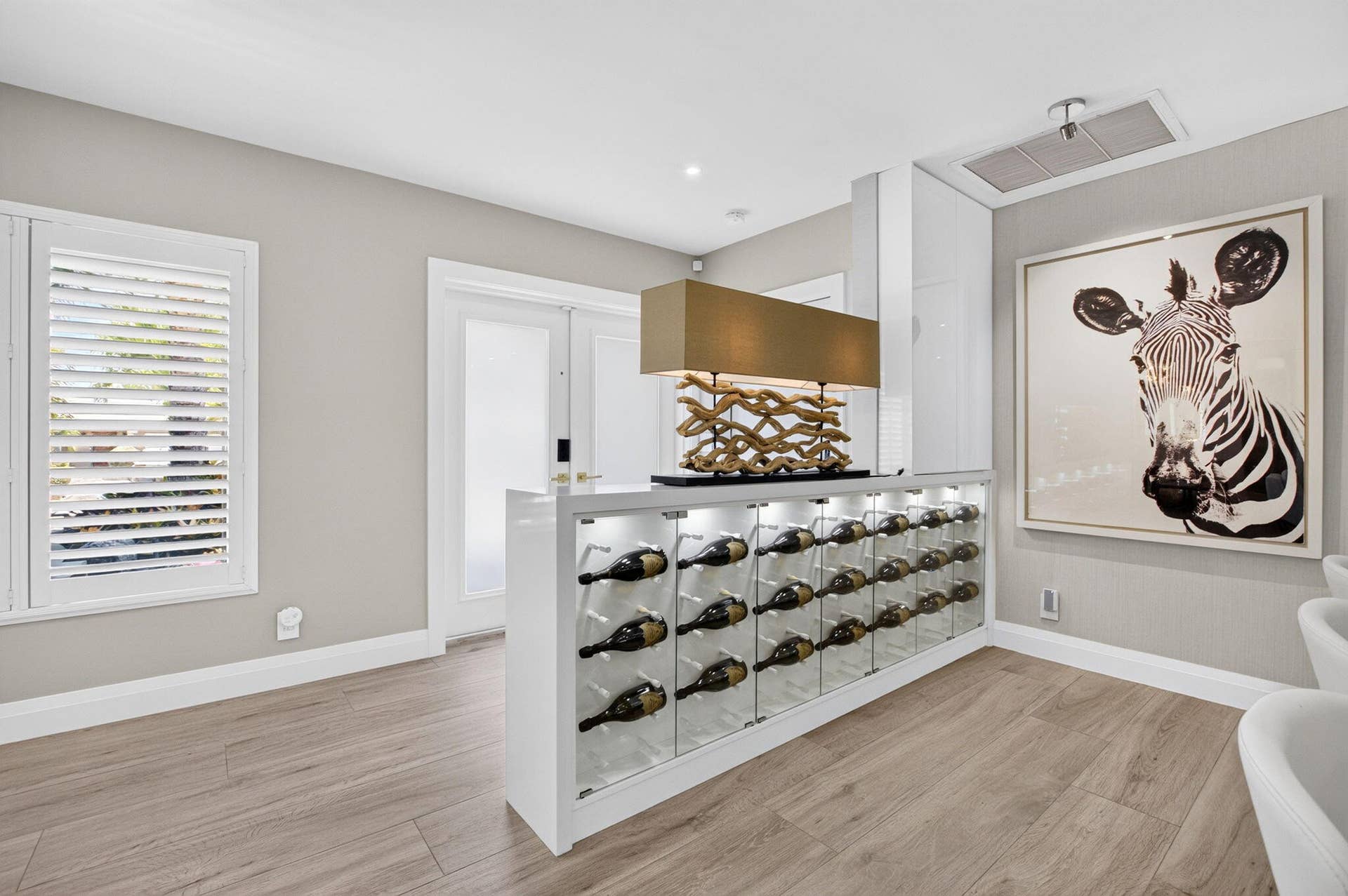 651 Juneberry Court, Boca Raton, FL 33486 FOYER VIEW WITH WINE WALL