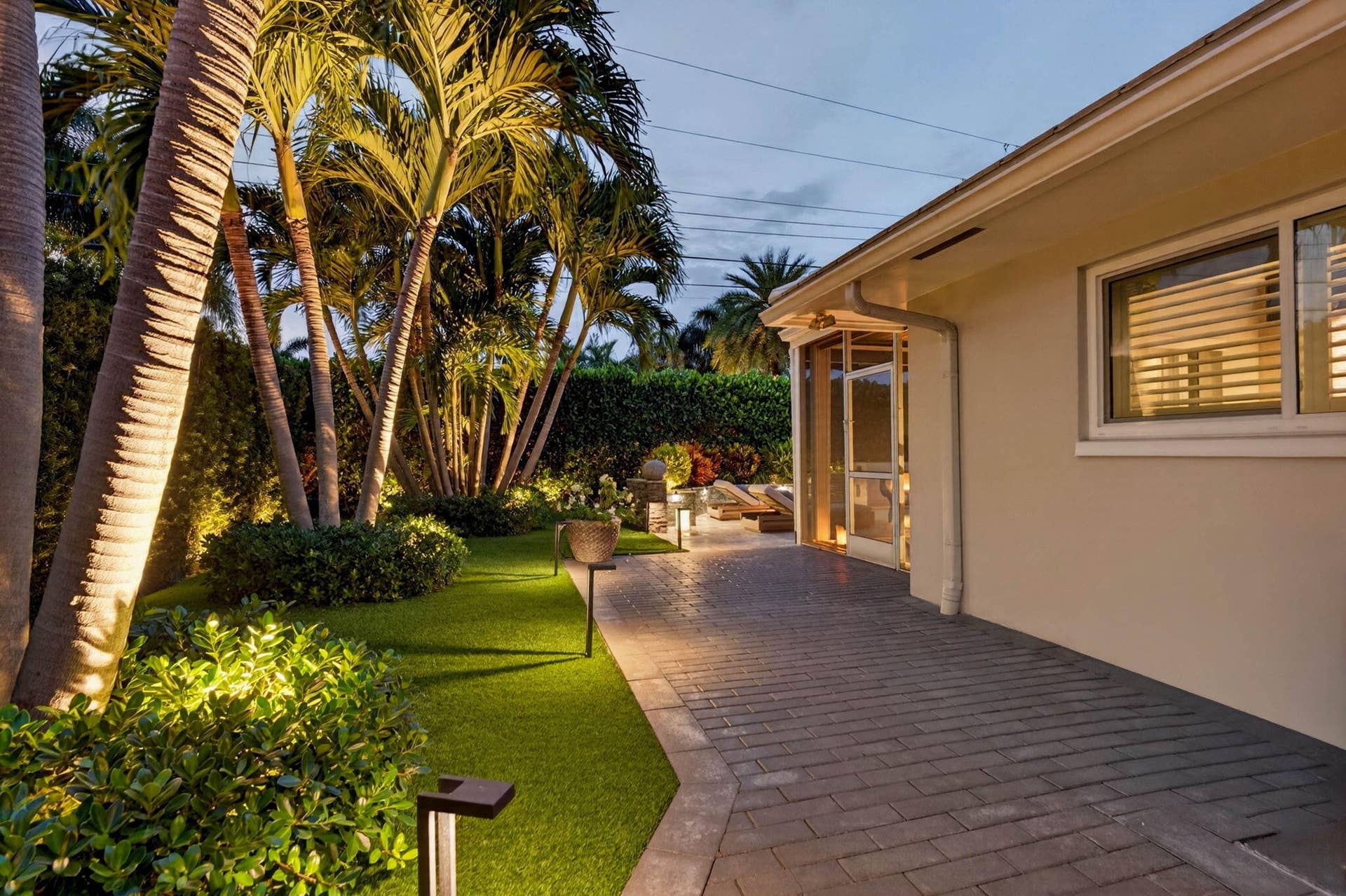 651 Juneberry Court, Boca Raton, FL 33486 SIDEYARD VIEW AT NIGHT
