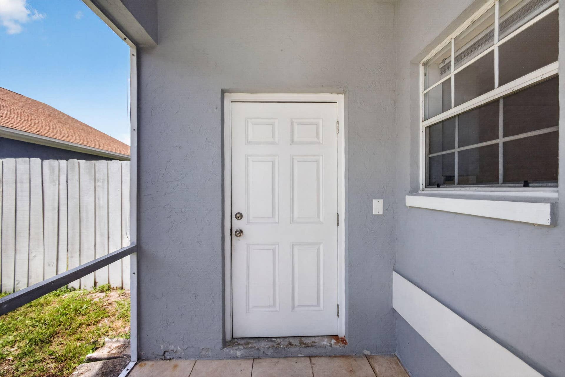 3871 Circle Lake Drive, West Palm Beach, FL 33417 Screened porch entry