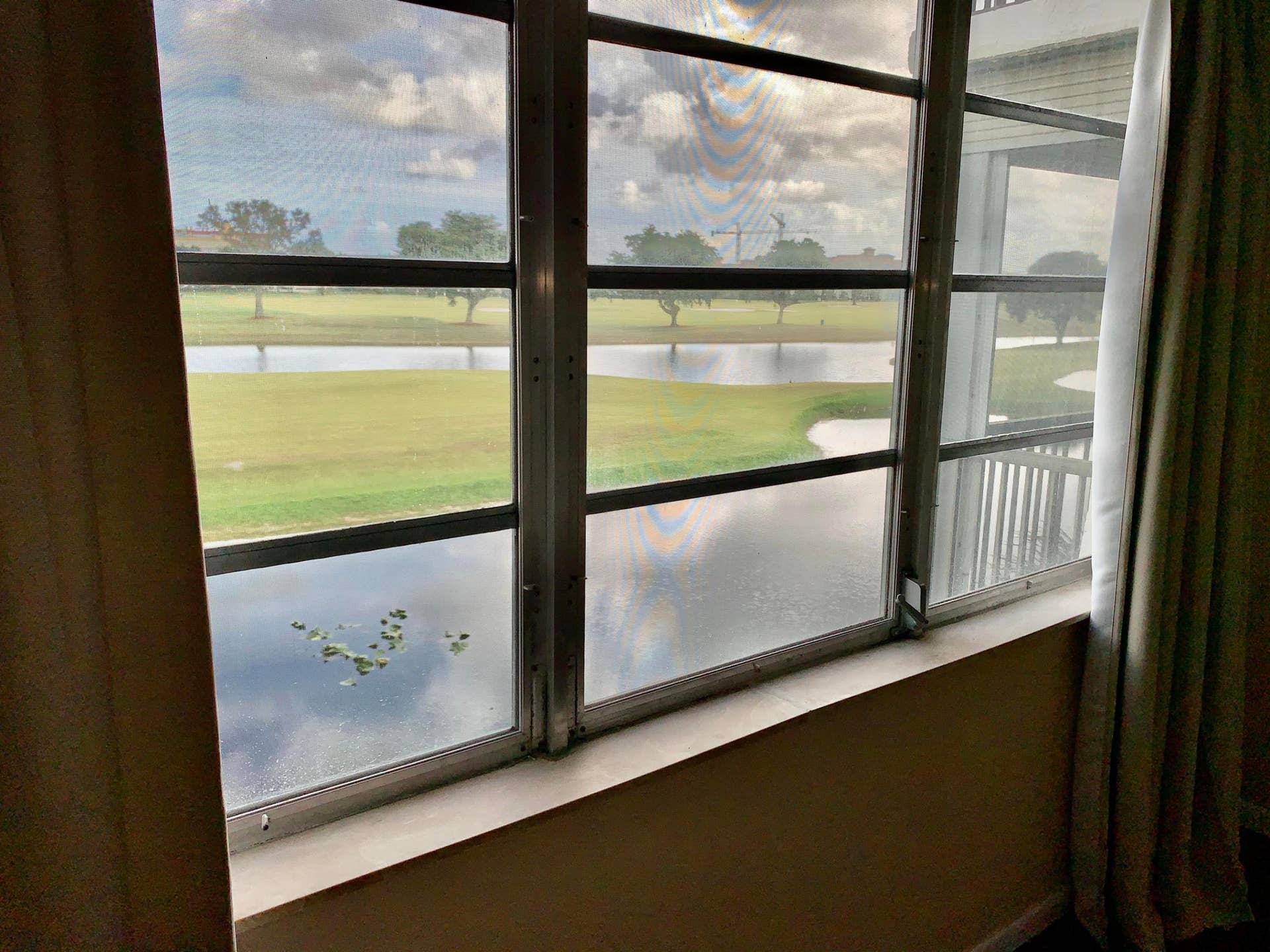 3100 W Rolling Hills Circle, #309, Davie, Davie, FL 33328 Expansive window providing direct visibility of a golf course and water features