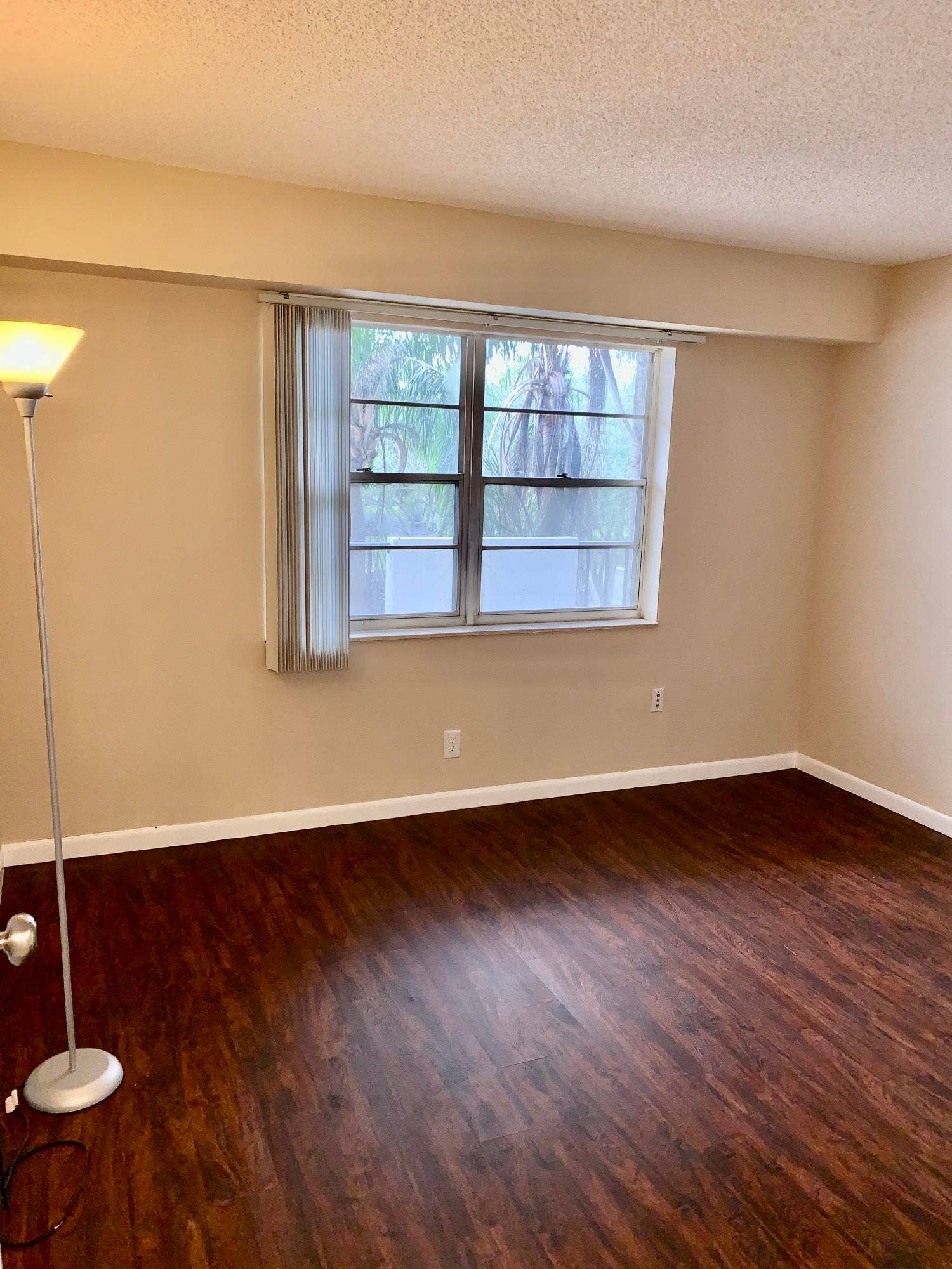 3100 W Rolling Hills Circle, #309, Davie, Davie, FL 33328 Neutral-toned walls complement wood-finish flooring