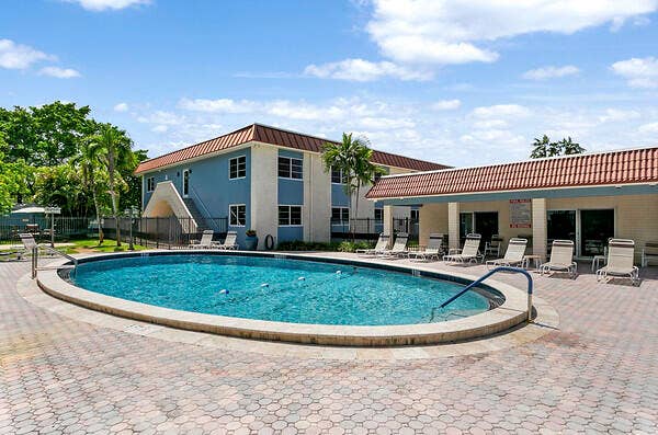 Lg Community Pool at Clubhouse w/BBQ area.