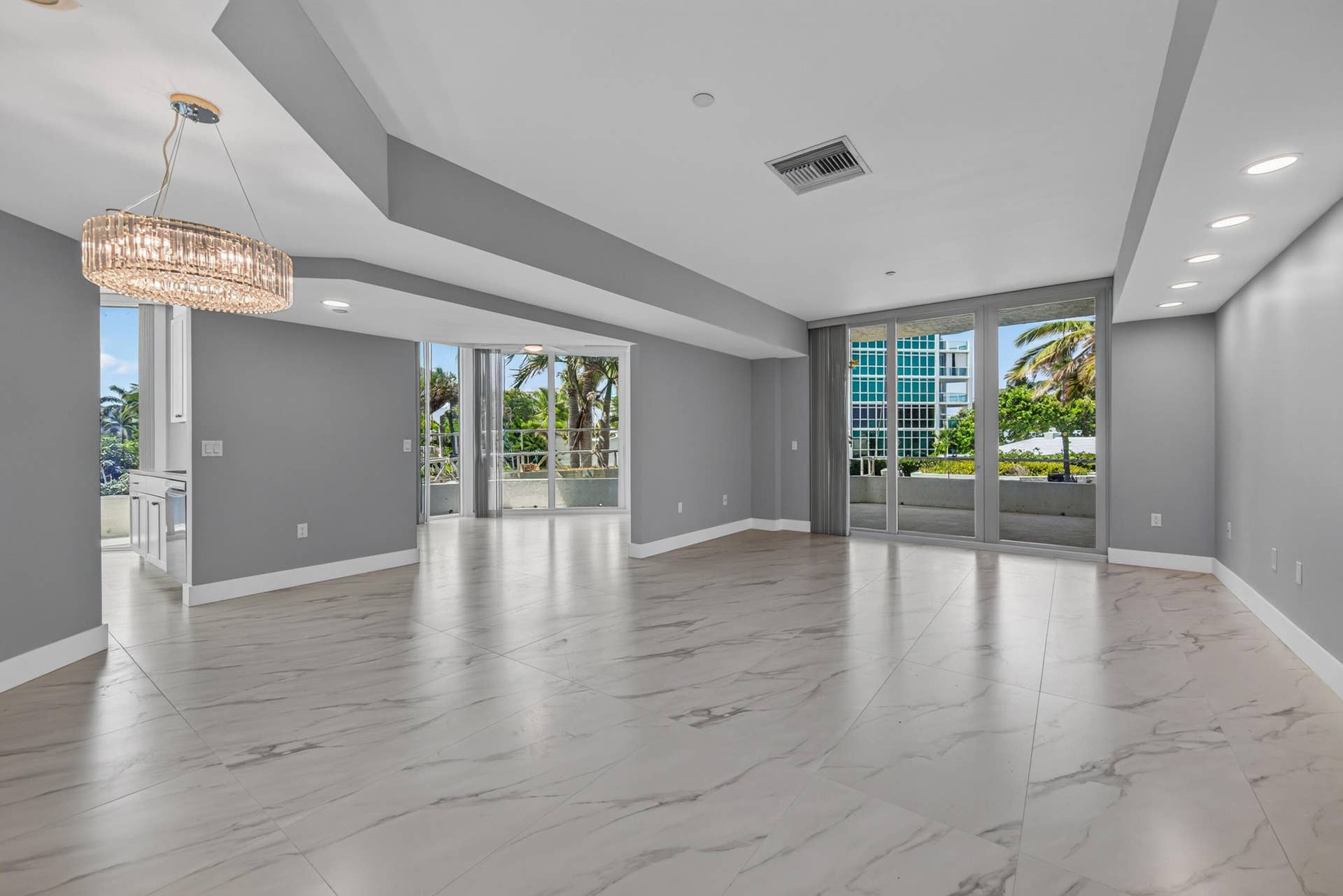UNSTAGED!! This Picture shows views of living room, den & Kitchen facing west.