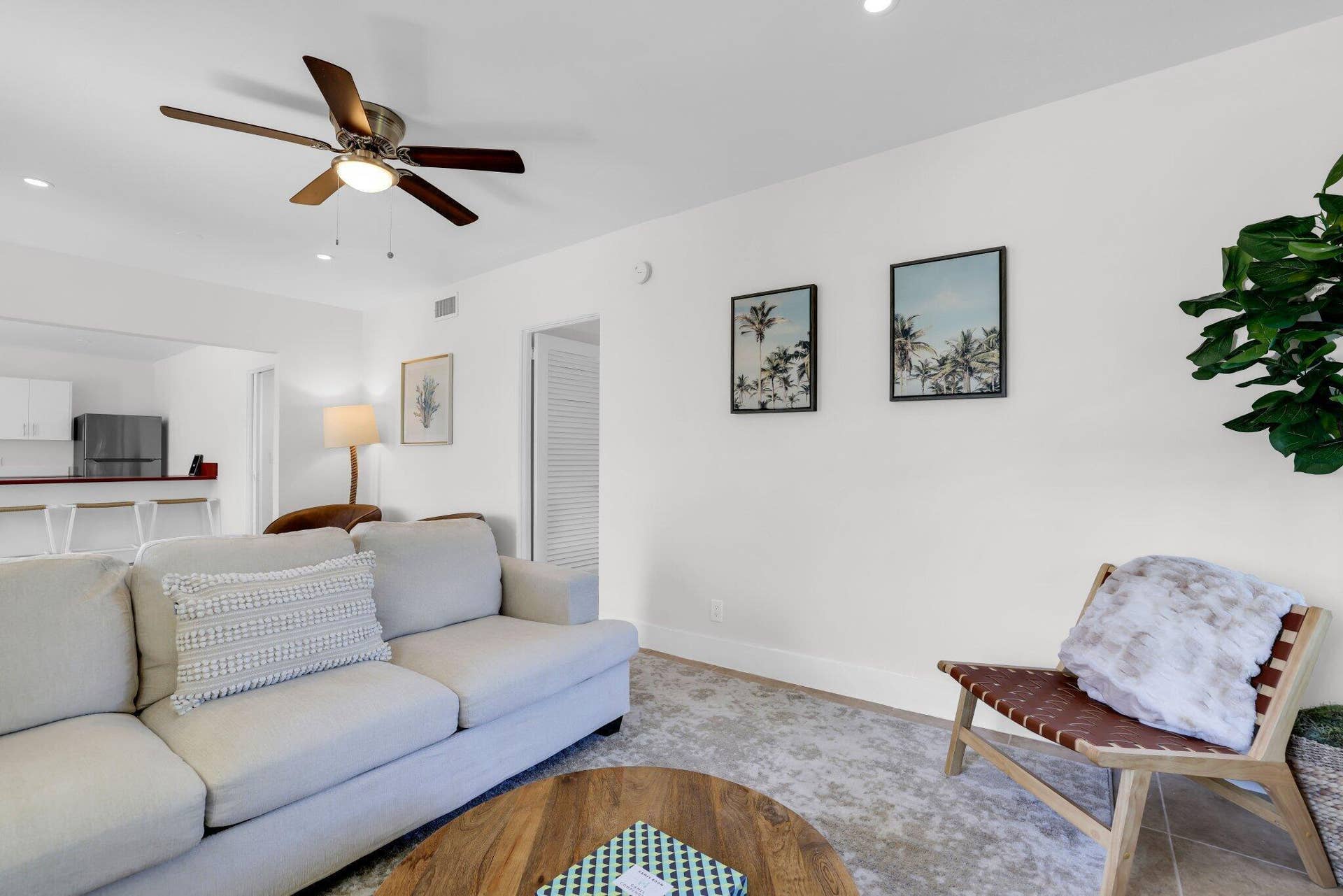 320 Inlet Way, #4, Palm Beach Shores, Palm Beach Shores, FL 33404 Living area featuring recessed lighting, a ceiling fan with integrated illumination, a wide entryway to a kitchen, and light-toned flooring