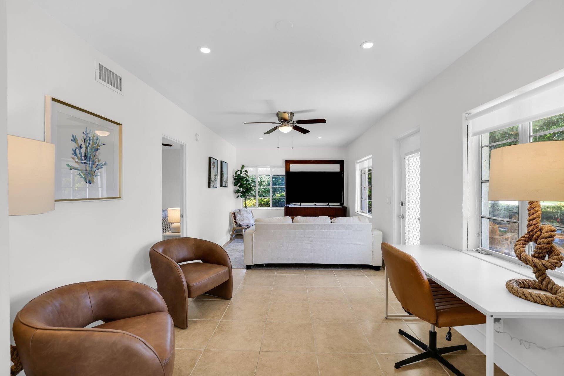 320 Inlet Way, #4, Palm Beach Shores, Palm Beach Shores, FL 33404 Spacious room featuring tile flooring, white walls, recessed lighting, and multiple windows