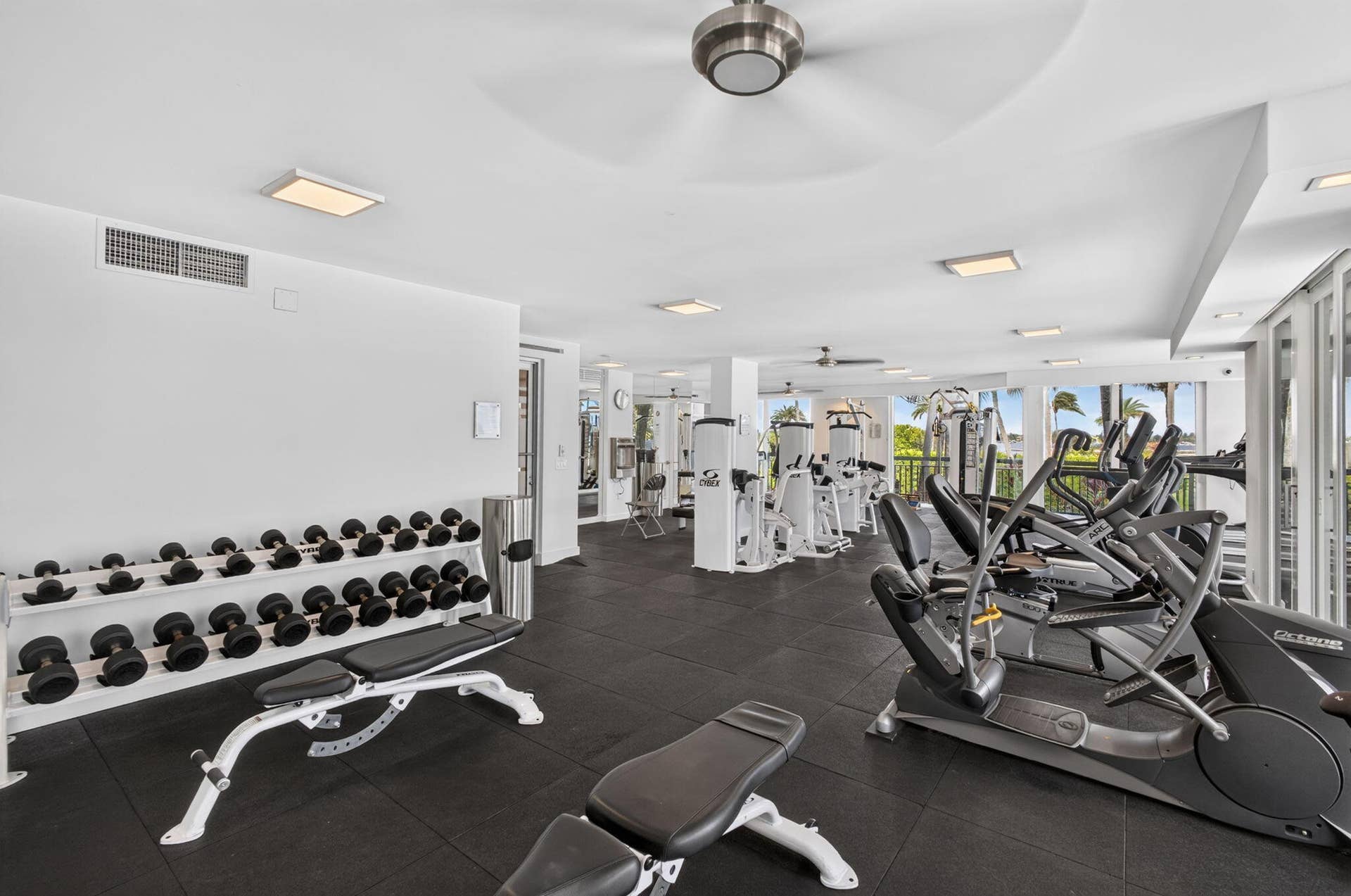 3140 S Ocean Boulevard, #101 S, Palm Beach, FL 33480 Spacious fitness center featuring rubber flooring, recessed lighting, and large windows