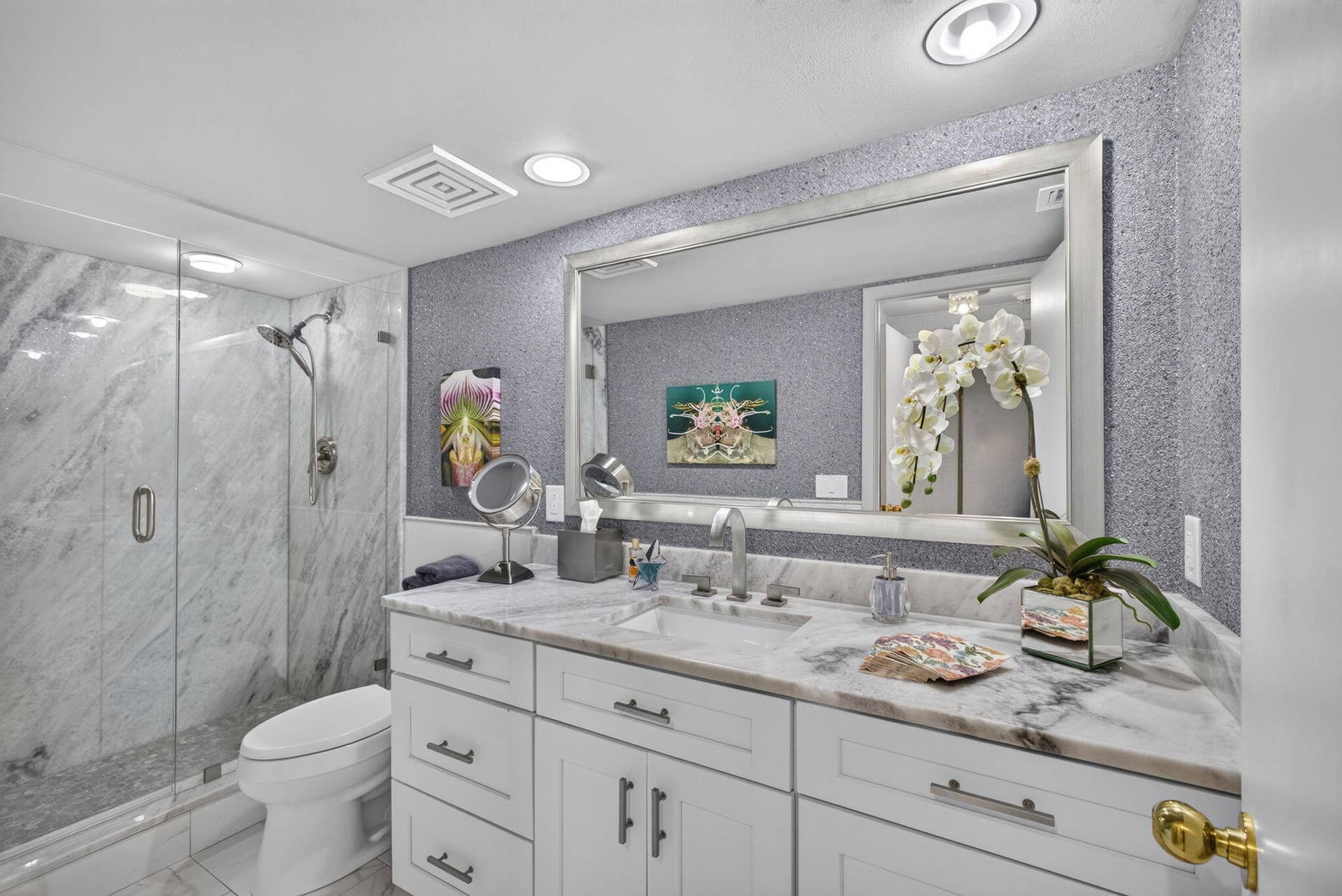 3140 S Ocean Boulevard, #101 S, Palm Beach, FL 33480 Bathroom featuring a white vanity with integrated sink, stone countertop, and a large wall-mounted mirror