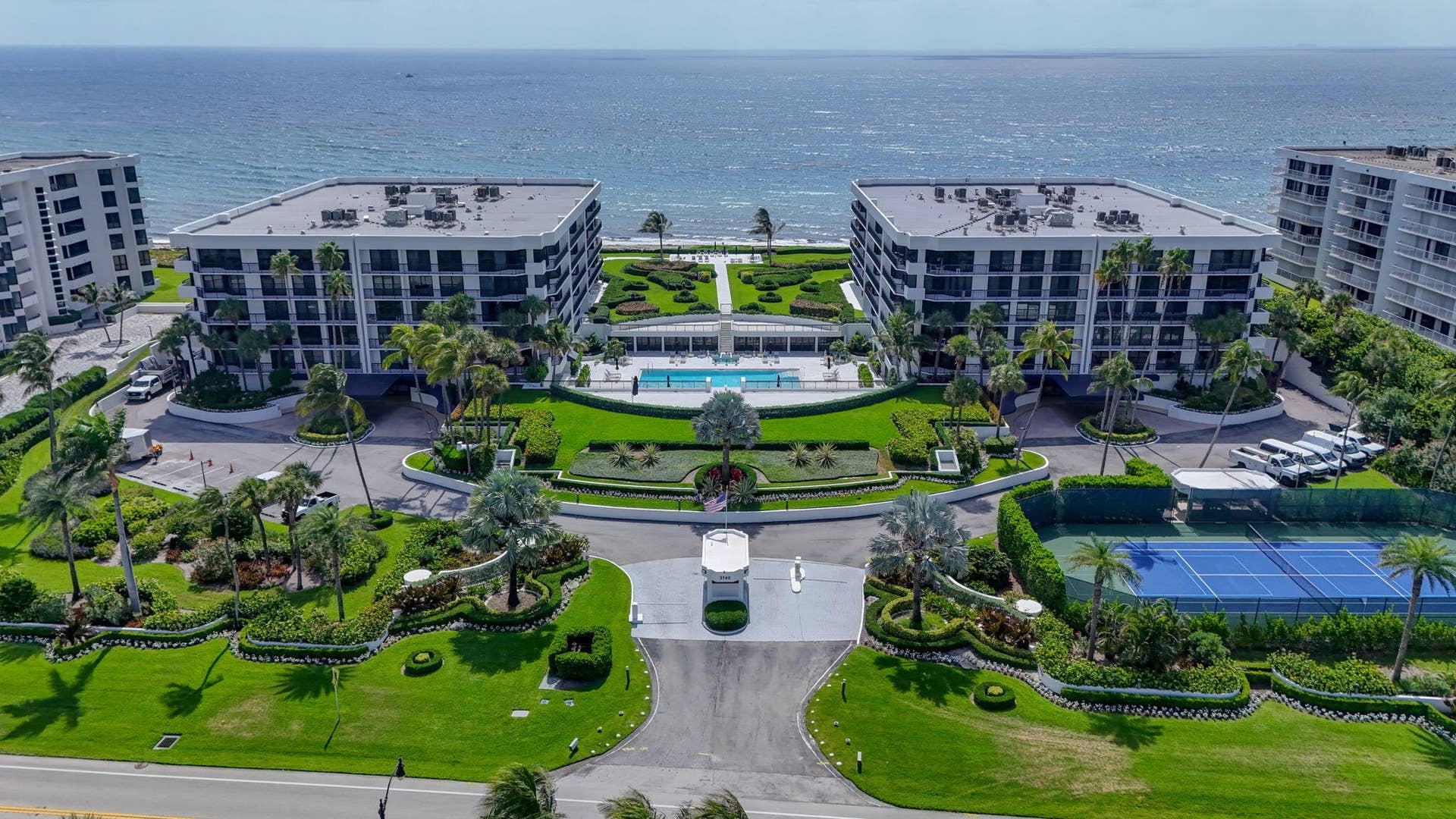 3140 S Ocean Boulevard, #101 S, Palm Beach, FL 33480 Oceanfront twin residential buildings featuring expansive landscaping