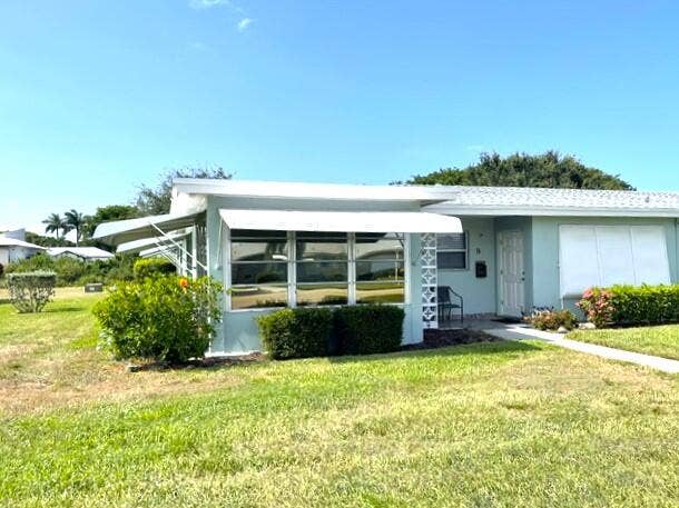 237 HIGH POINT Court W, #A, Delray Beach, FL 33445 Front view of corner villa 3