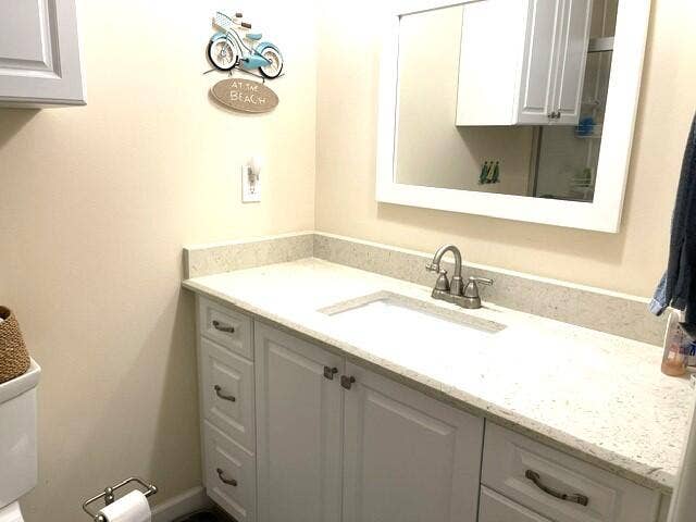 237 HIGH POINT Court W, #A, Delray Beach, FL 33445 Updated Guest bathroom