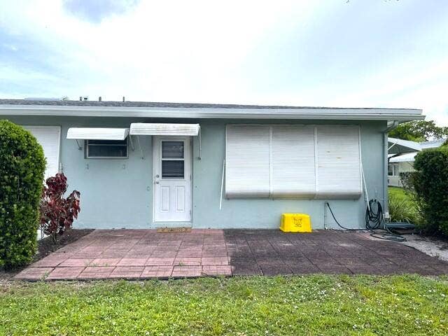 237 HIGH POINT Court W, #A, Delray Beach, FL 33445 Back yard patio view