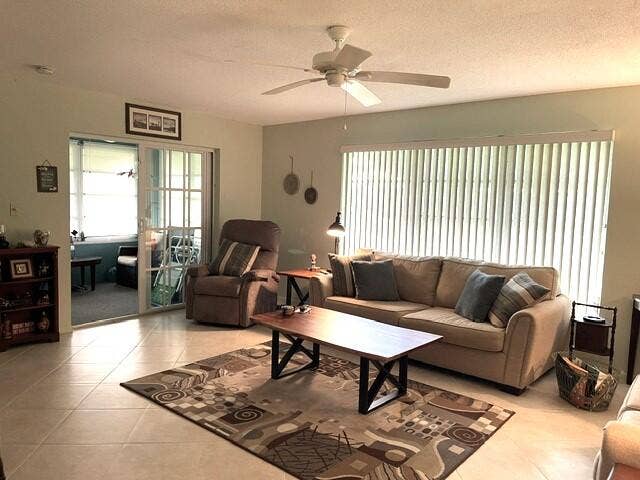 237 HIGH POINT Court W, #A, Delray Beach, FL 33445 Living room and Florida room views