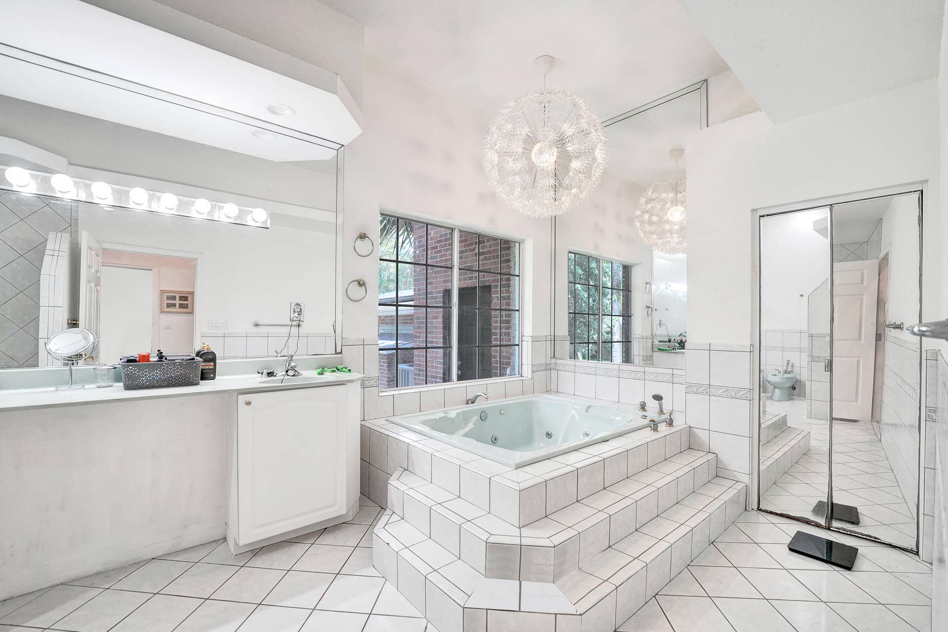 Original master bath is huge but could use a nice update... see next pics for a staged bathroom to show its true potential