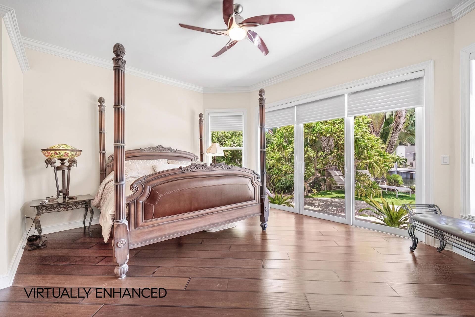 2761 NE 48TH Court, Lighthouse Point, FL 33064 Spacious room featuring wood-finish flooring, light-toned walls, and a ceiling fan