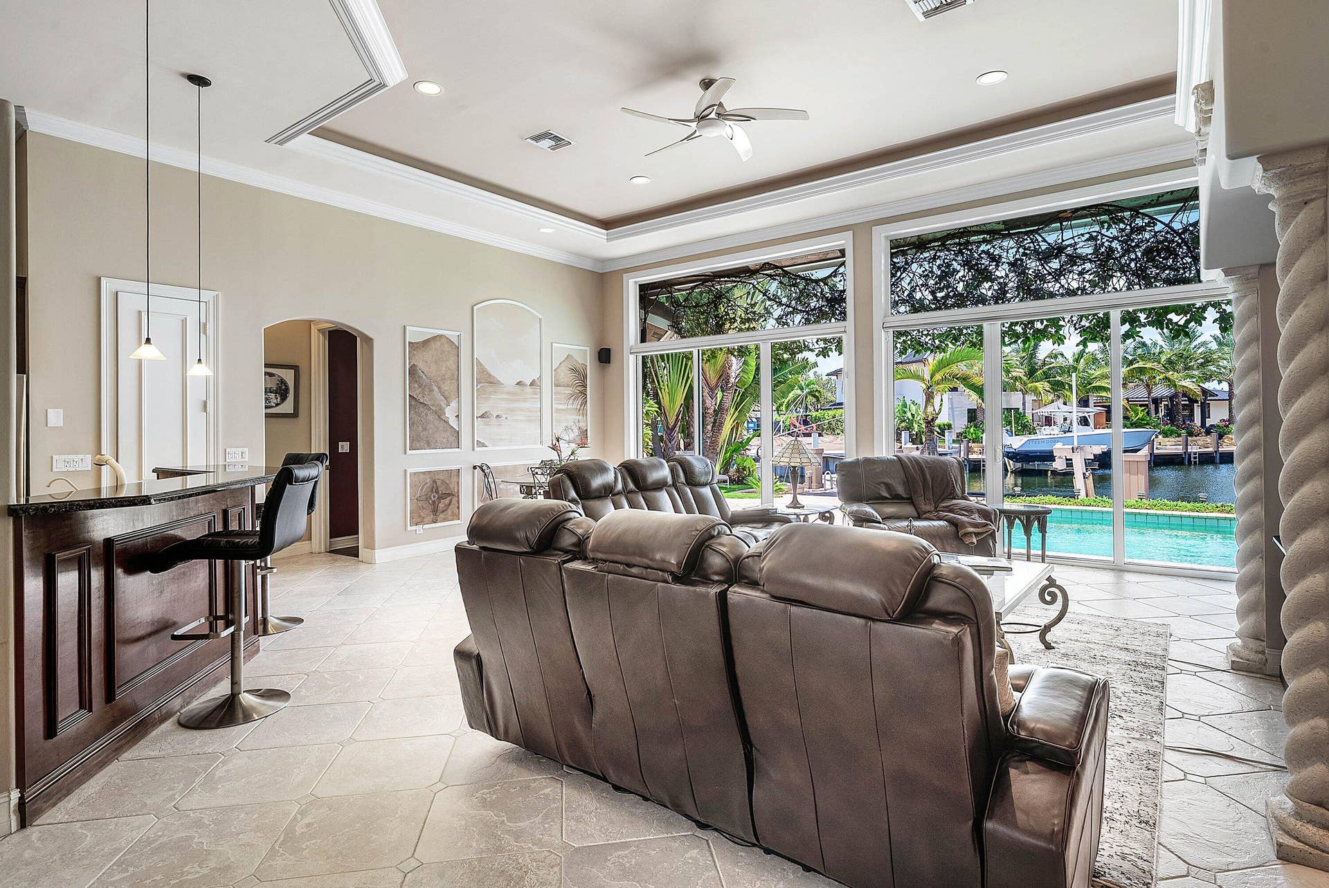 2761 NE 48TH Court, Lighthouse Point, FL 33064 Open-concept living area with extensive waterfront views