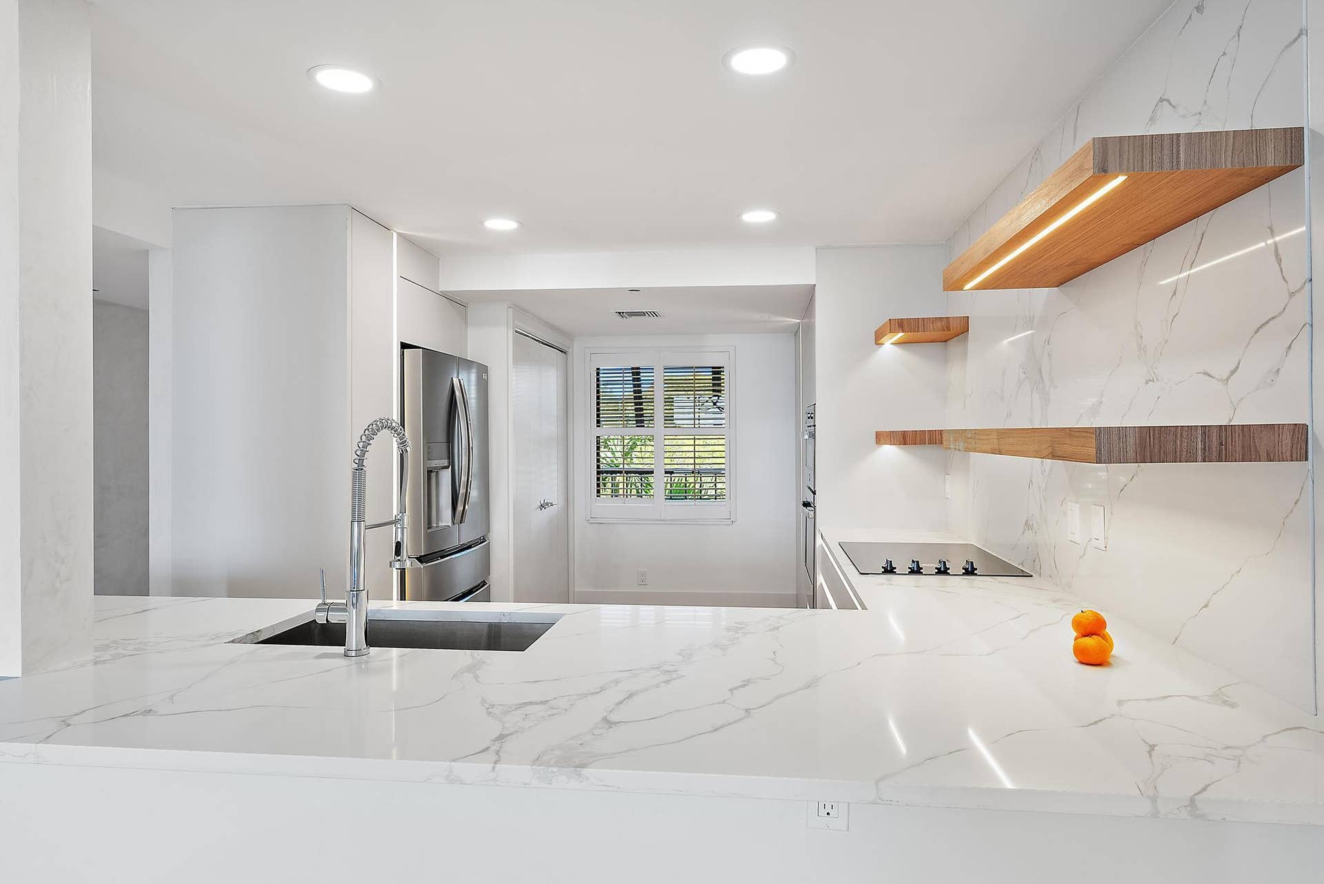 356 GOLFVIEW Road, #405, North Palm Beach, FL 33408 Kitchen View/Open Shutters