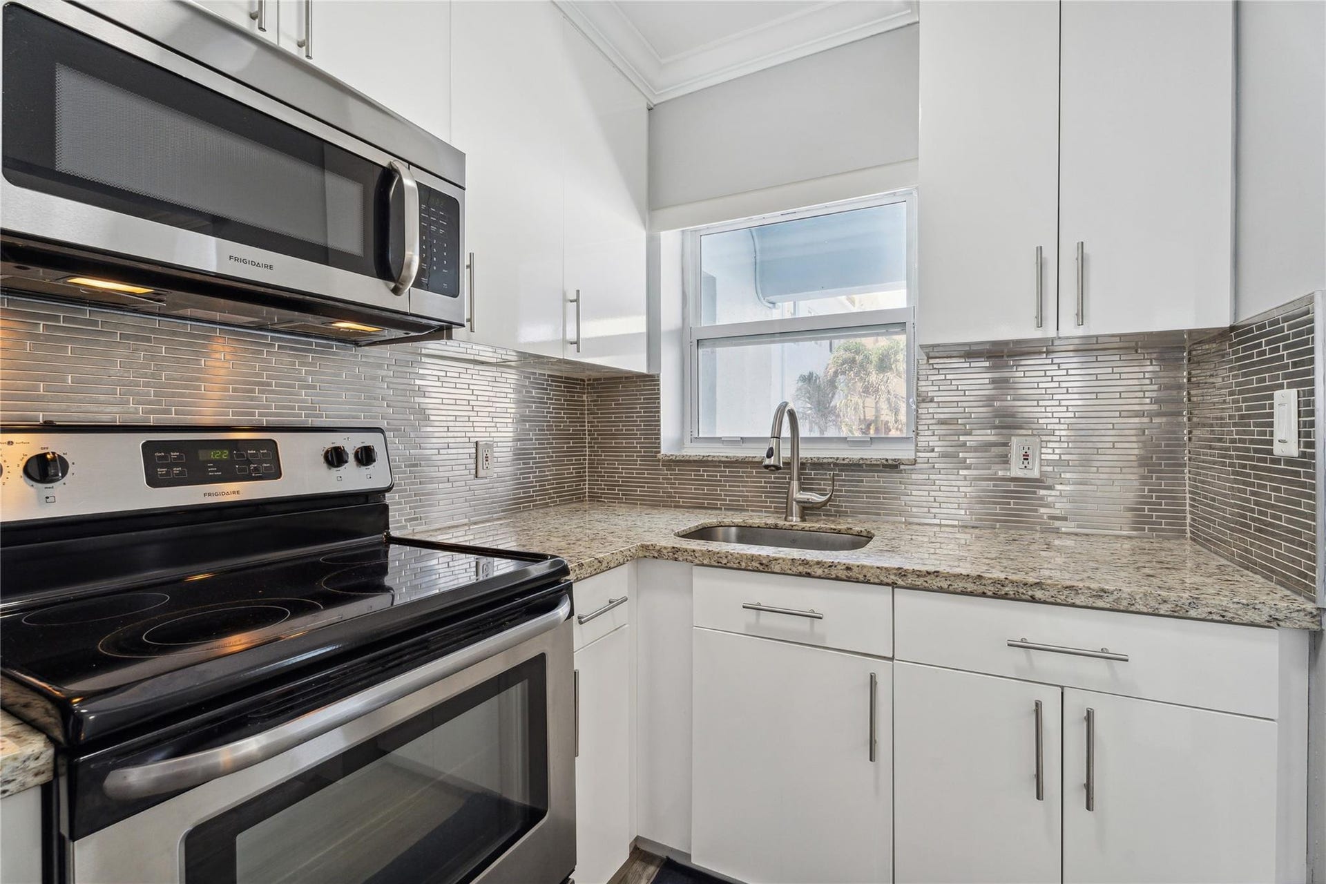 315 Van Buren Street, #205B, Hollywood, FL 33019 Granite kitchen with stainless appliances