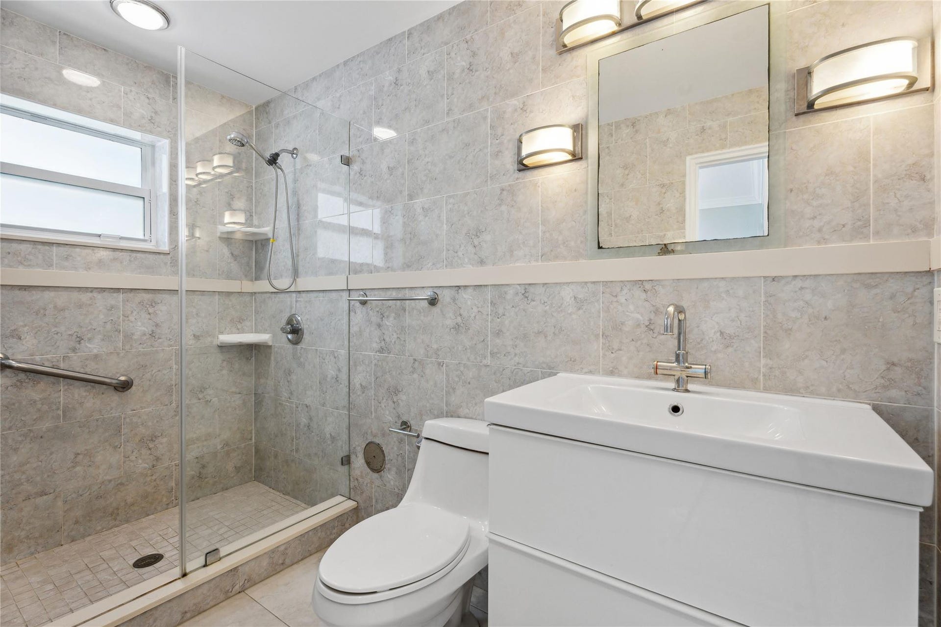 315 Van Buren Street, #205B, Hollywood, FL 33019 All tiled with large step in shower-glass door