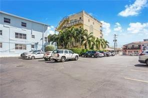 315 Van Buren Street, #205B, Hollywood, FL 33019 Complex private lot with 1 assigned space