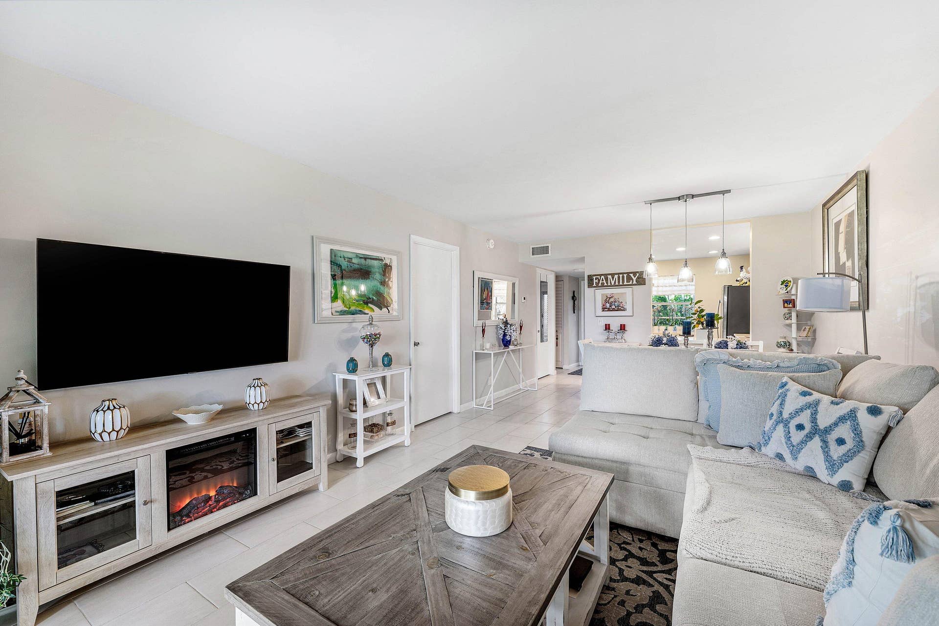 Cozy up on the couch to watch a movie and enjoy the ambiance from the fireplace.