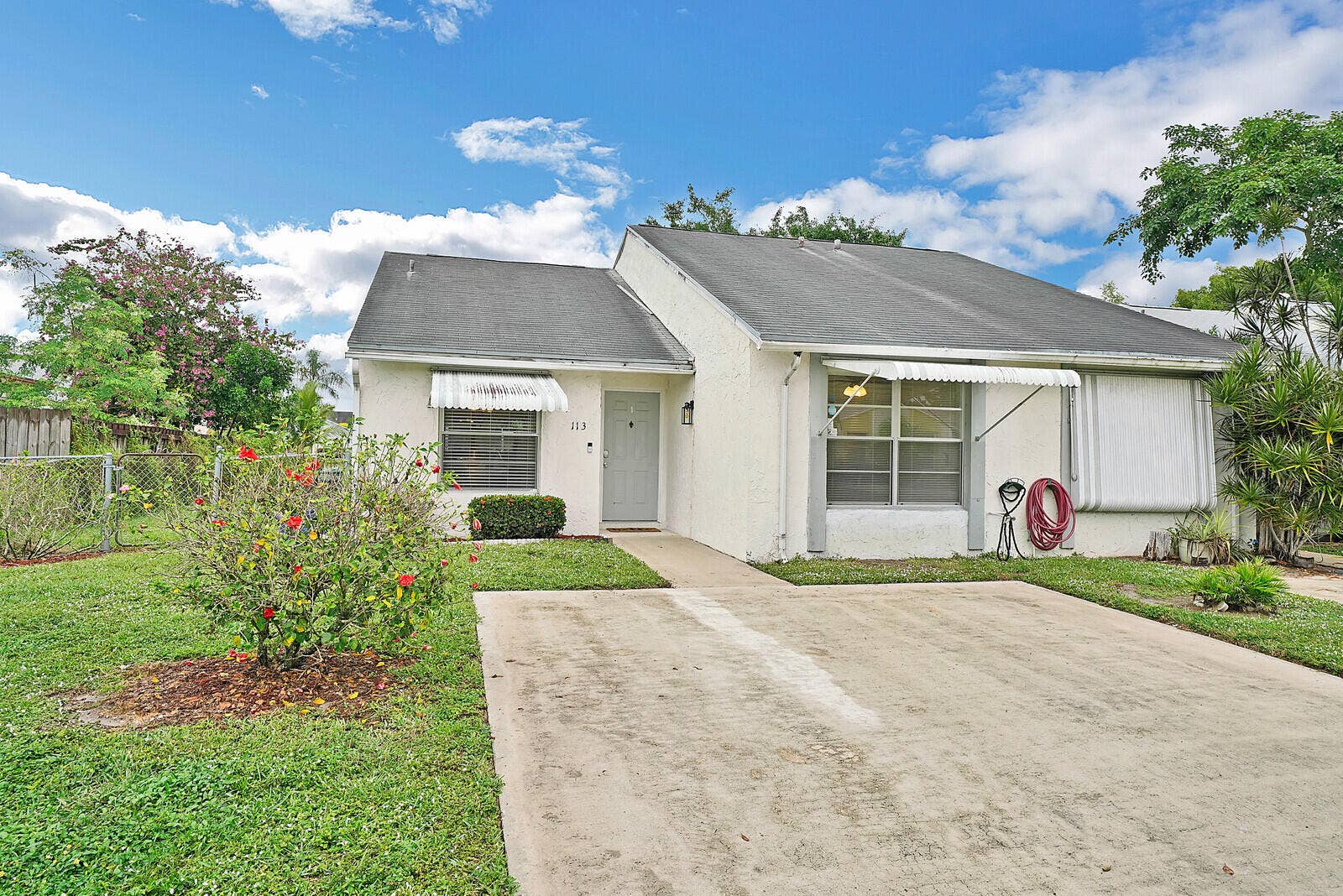 113 PINEWOOD Court, Jupiter, FL 33458 Front of the Home