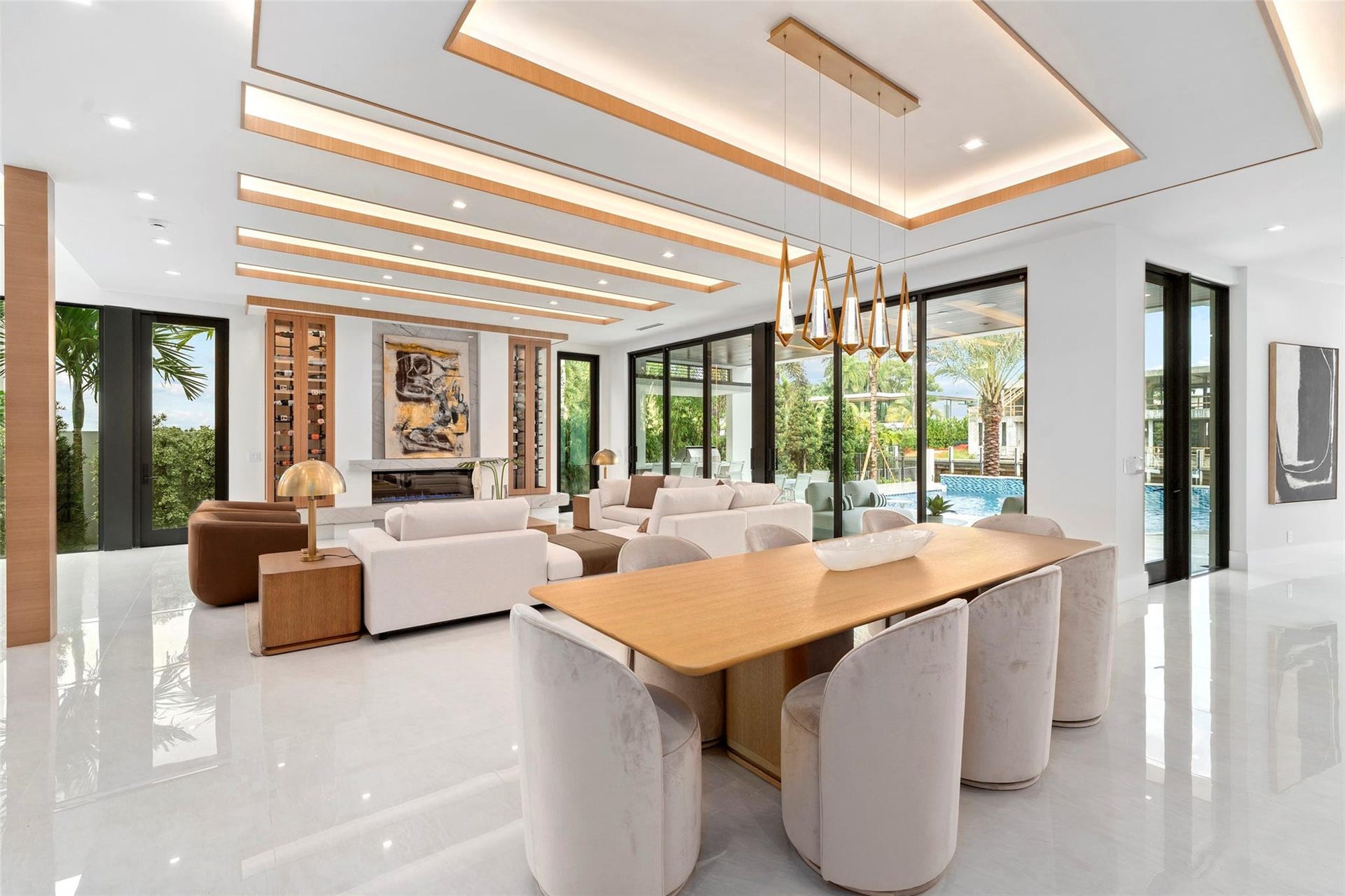 Rich finishes, custom millwork, and refined architectural details create a timeless sense of elegance, just minutes from the ocean and downtown Fort Lauderdale.