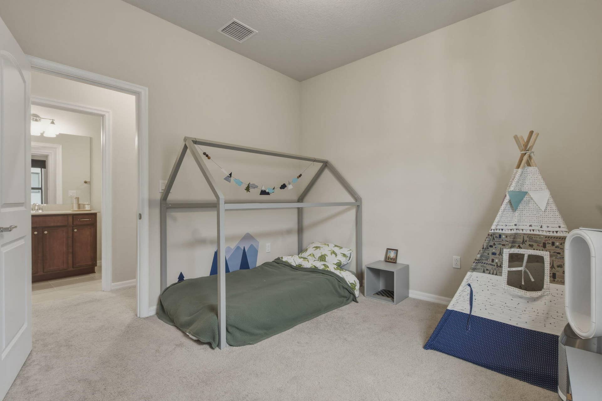 4601 Pinehurst Trail E, Oakland Park, FL 33309 Carpeted bedroom with a vaulted ceiling and a neutral wall color