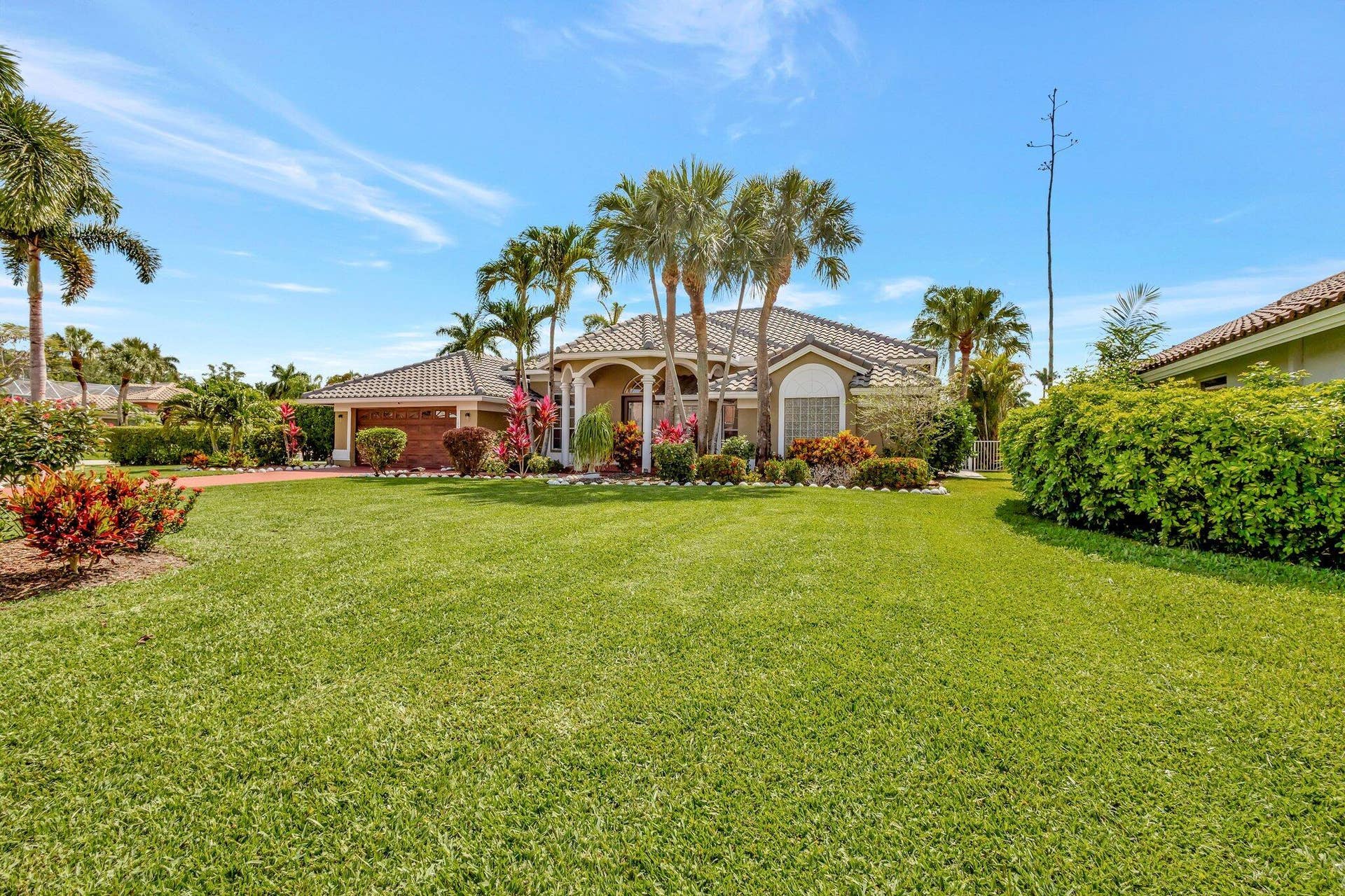 19236 BAY LEAF Court, Boca Raton, FL 33498 House was built further away from the street than many of the other homes in the neighborhood.