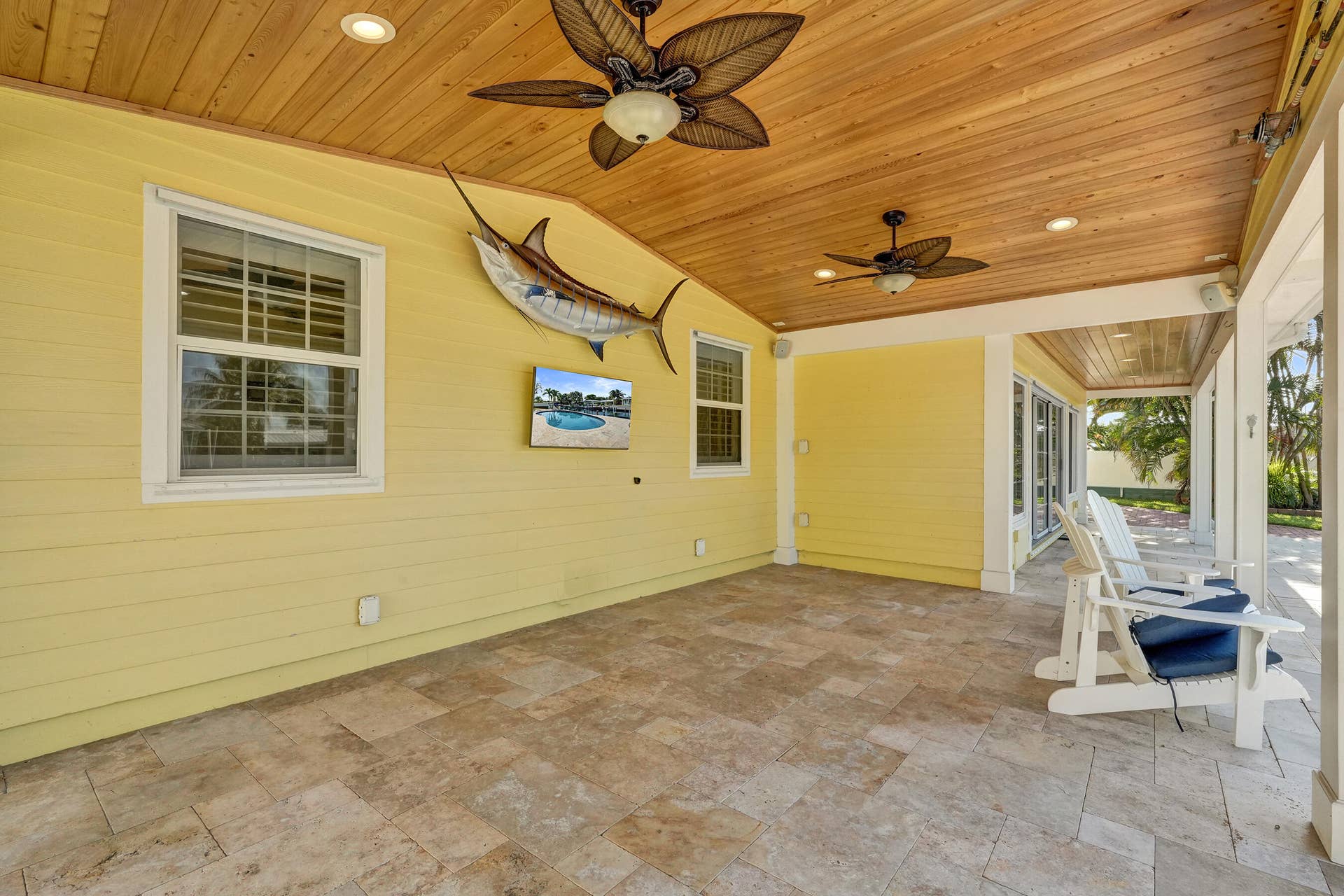 733 JACANA Way, North Palm Beach, FL 33408 Large covered patio with Cypress T&G ceilings 21'4 x 13'. Icynene foam insulation installed beneath the cypress patio ceiling.