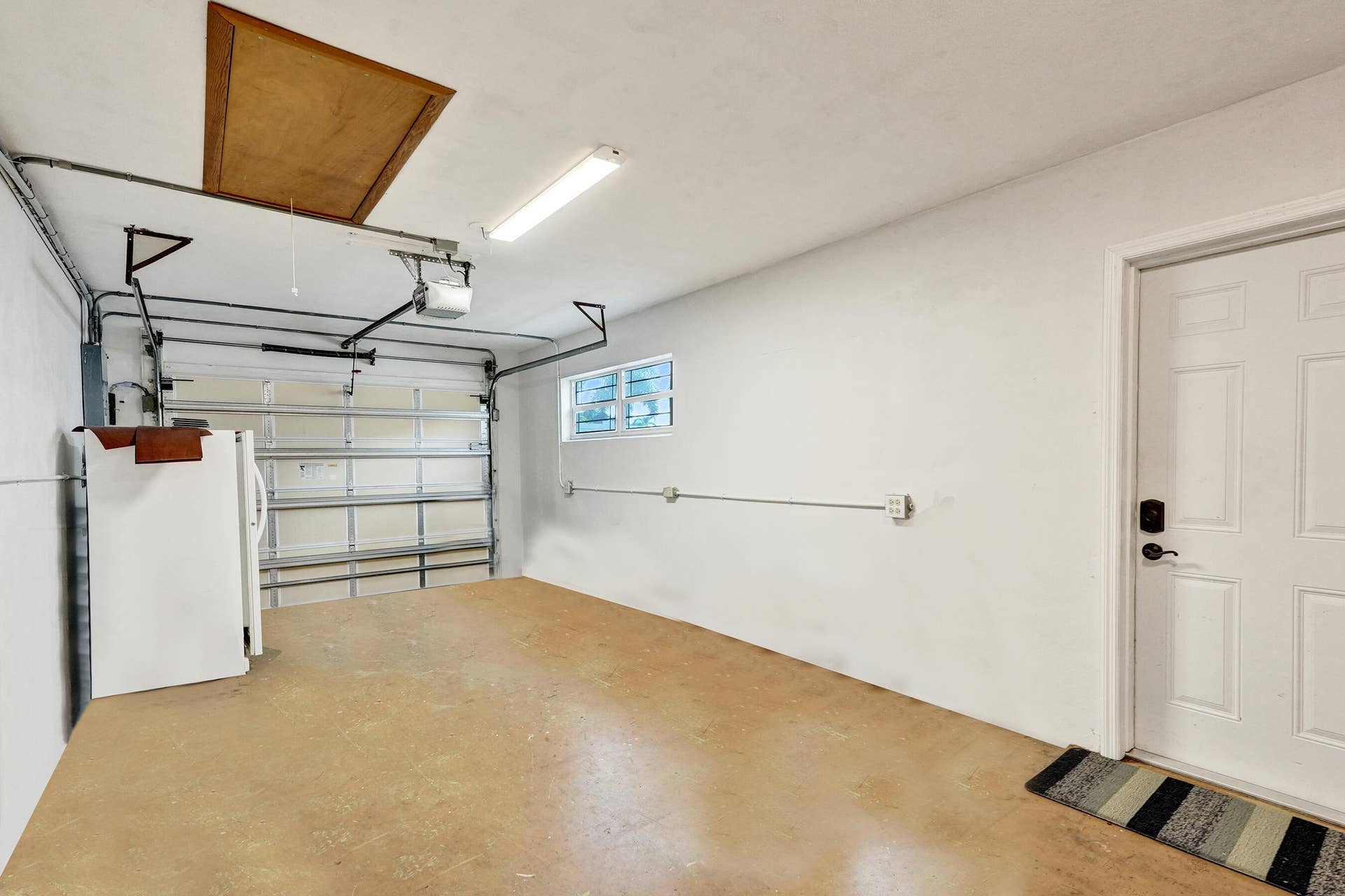 733 JACANA Way, North Palm Beach, FL 33408 1 car garage measuring 26'6 x 11'7.