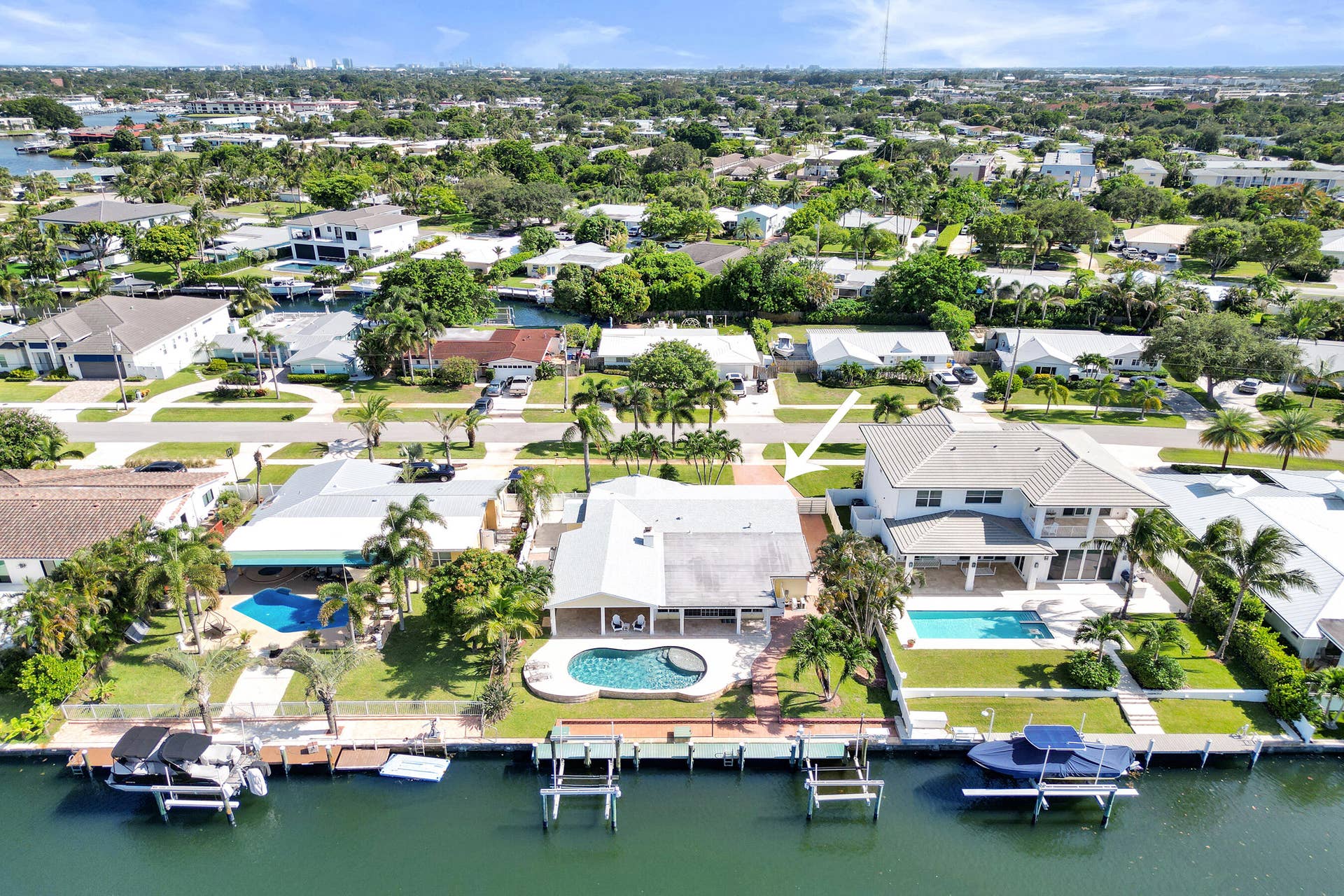 733 JACANA Way, North Palm Beach, FL 33408 Waterfront pool home with 2 boat lifts.