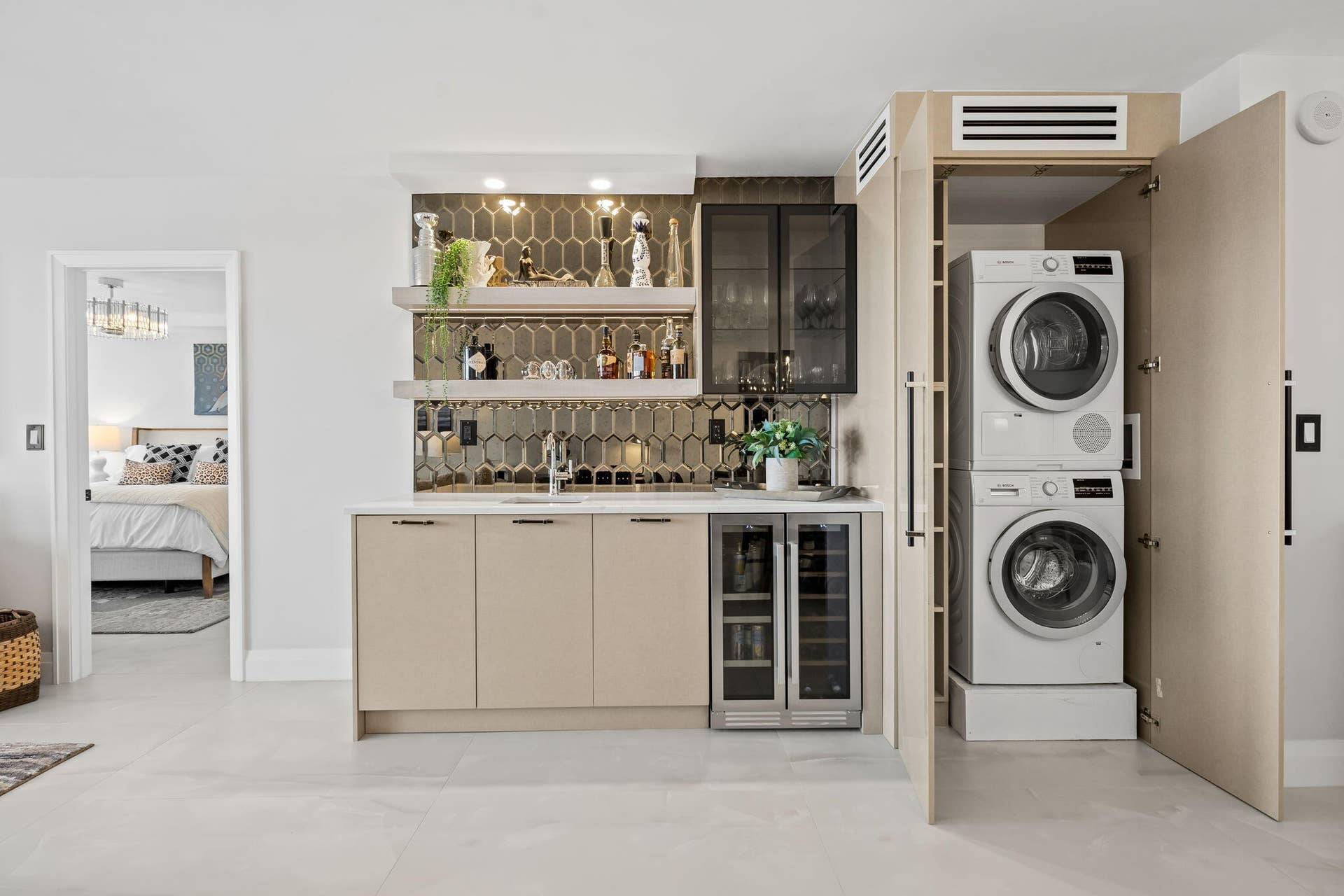 511 BAYSHORE Drive, #603, Fort Lauderdale, Fort Lauderdale, FL 33304 Integrated wet bar featuring a geometric tile backsplash, undermount sink, and open shelving