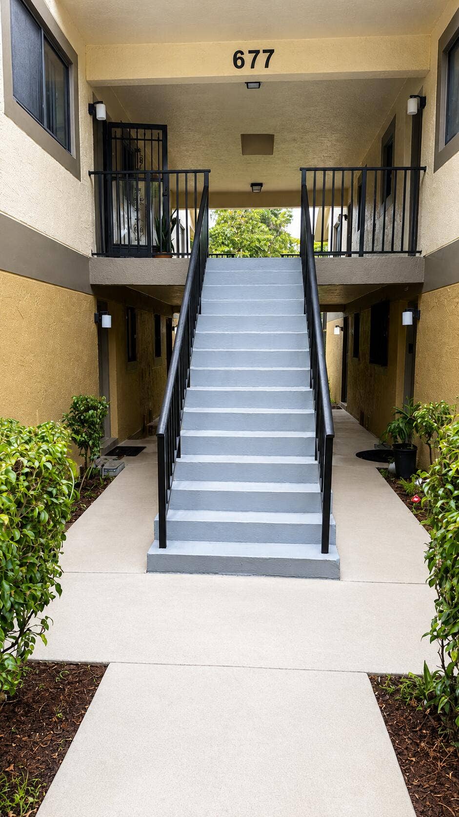 677 TRACE Circle, #205, Deerfield Beach, Deerfield Beach, FL 33441 staircase to front door