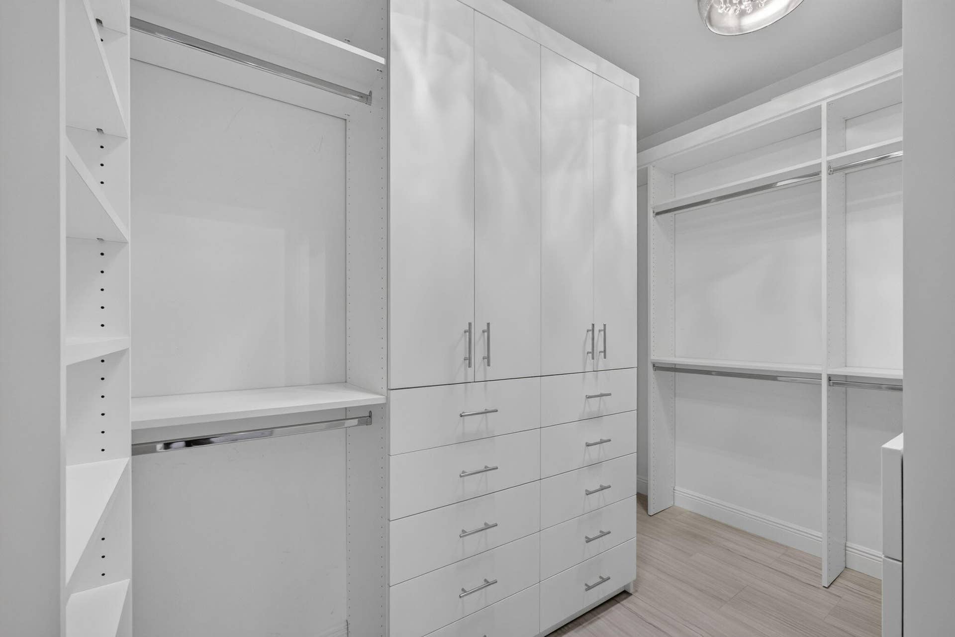 131 INLET WATERS Circle, Jupiter, FL 33477 CUSTOM BUILT-IN PRIMARY CLOSET