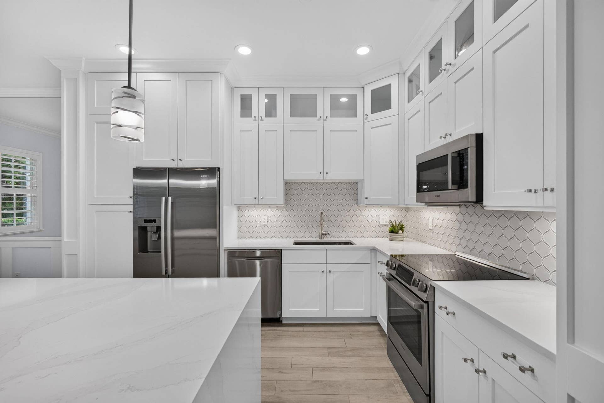 131 INLET WATERS Circle, Jupiter, FL 33477 KITCHEN WITH BOSCH REFRIGERATOR & DISHWASHER
