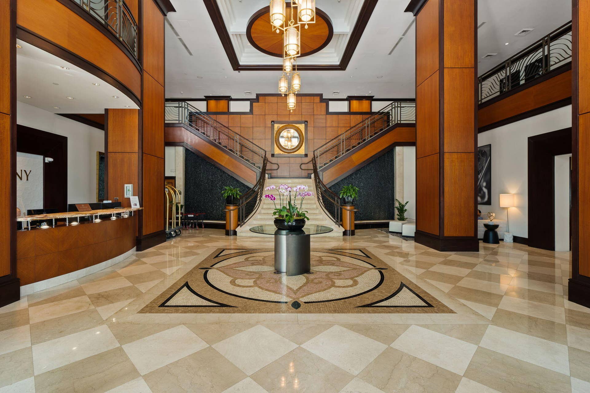 610 W Las Olas Boulevard, #115N, Fort Lauderdale, FL 33312 Grand two-story lobby with marble flooring, sweeping double staircases & a staffed front desk.