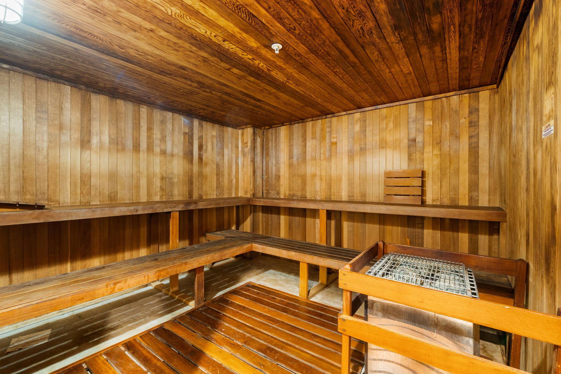 610 W Las Olas Boulevard, #115N, Fort Lauderdale, FL 33312 Wood-paneled sauna with tiered bench seating, part of The Symphonys on-site wellness amenities.