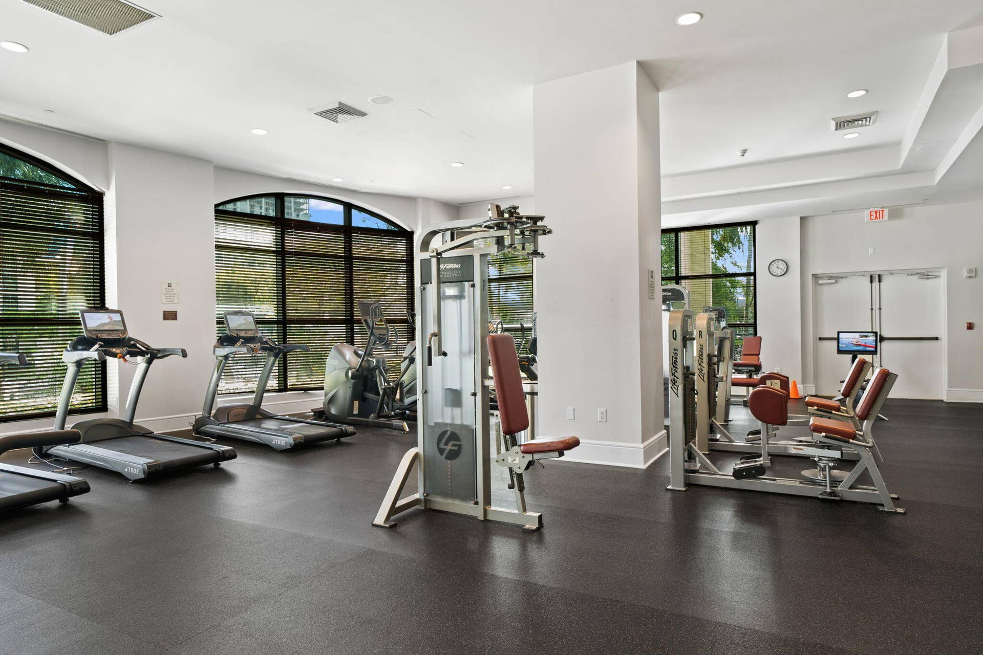 610 W Las Olas Boulevard, #115N, Fort Lauderdale, FL 33312 Fully equipped fitness center with treadmills, cardio equipment, strength machines & large windows with views of the New River.