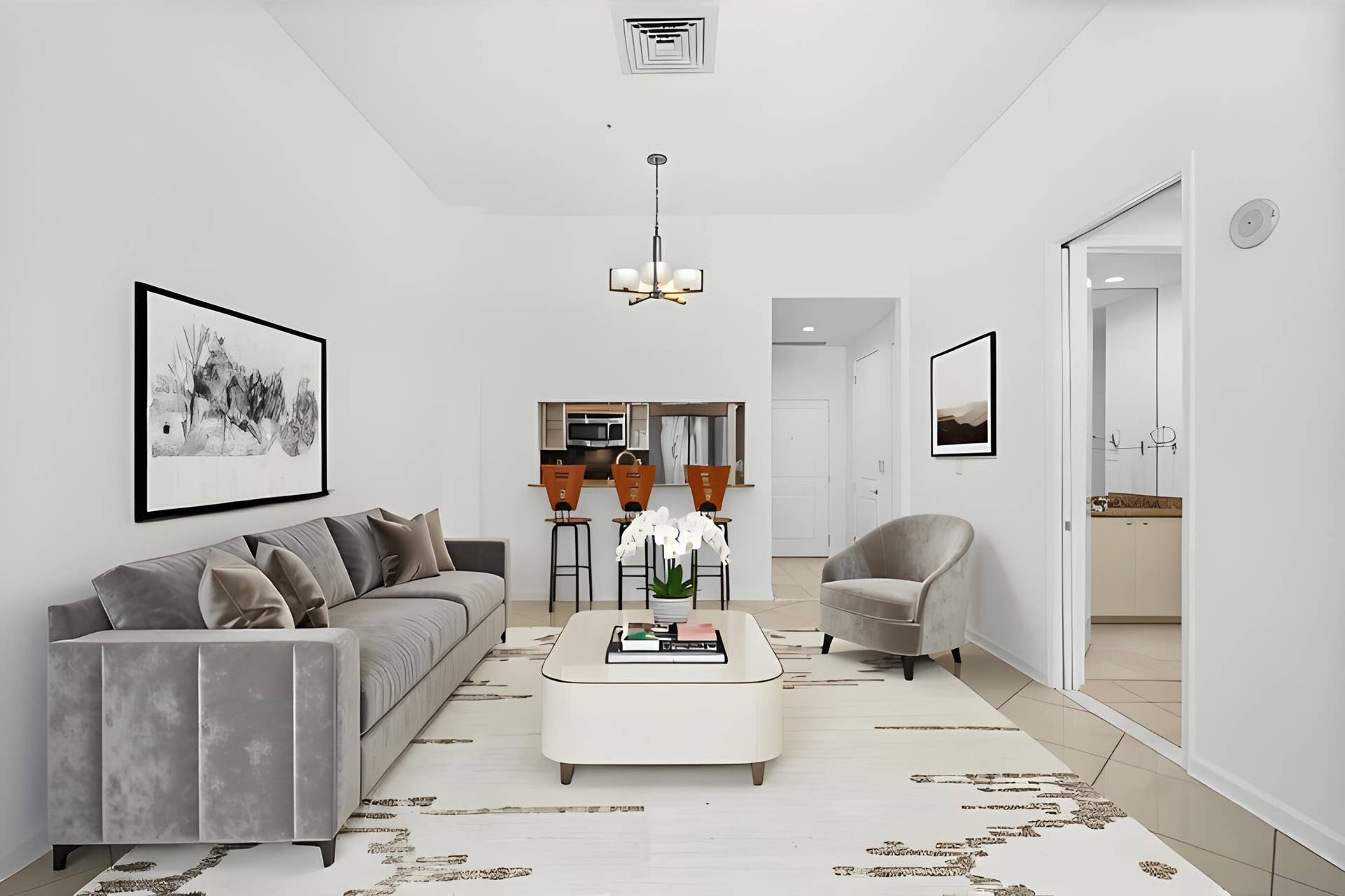 610 W Las Olas Boulevard, #115N, Fort Lauderdale, FL 33312 Open living & dining area featuring 11-foot ceilings, tile flooring throughout & a breakfast bar with counter seating.