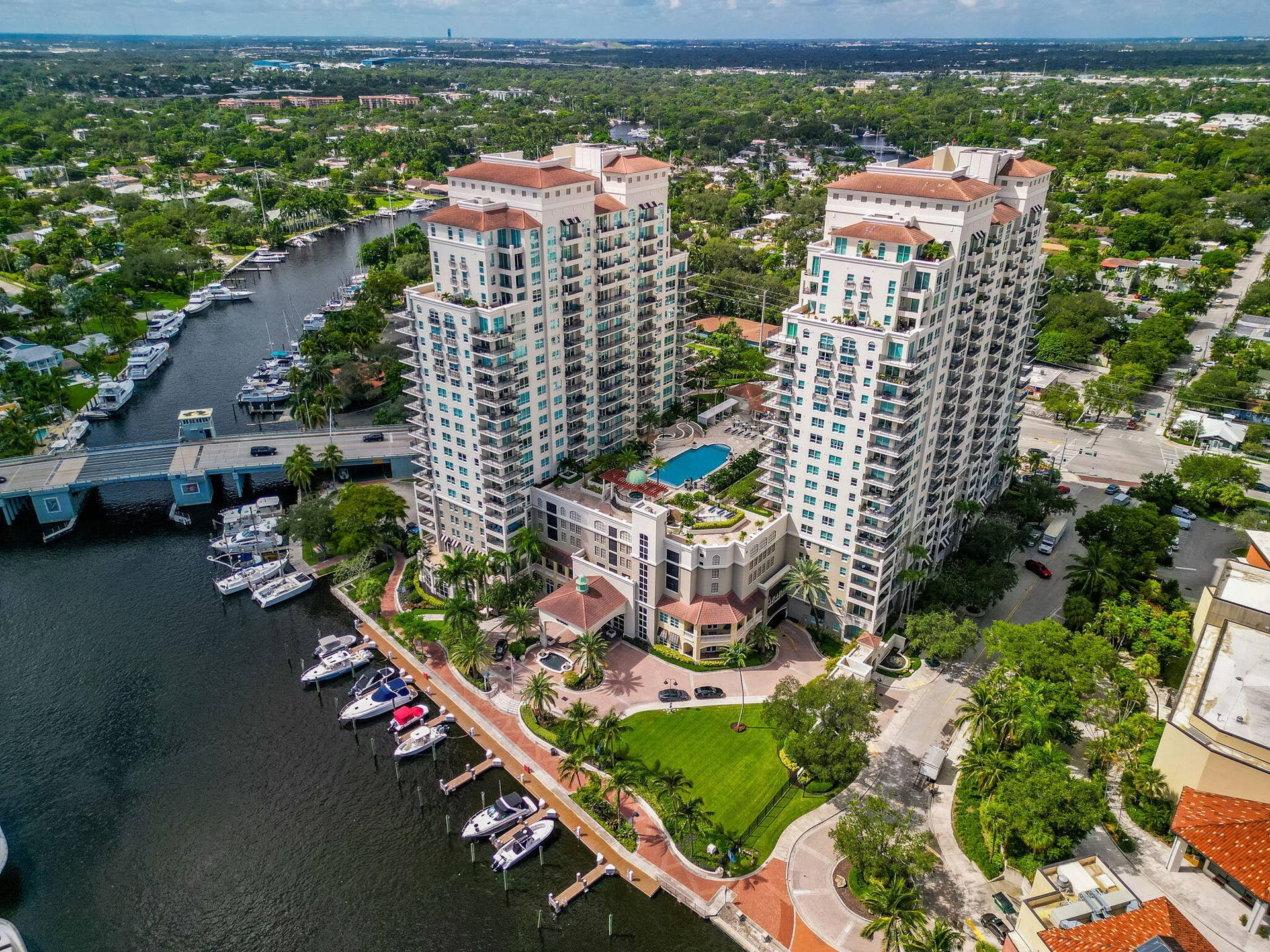 610 W Las Olas Boulevard, #115N, Fort Lauderdale, FL 33312 Aerial overview of The Symphonys towers, pool deck, private marina & exceptional New River setting.