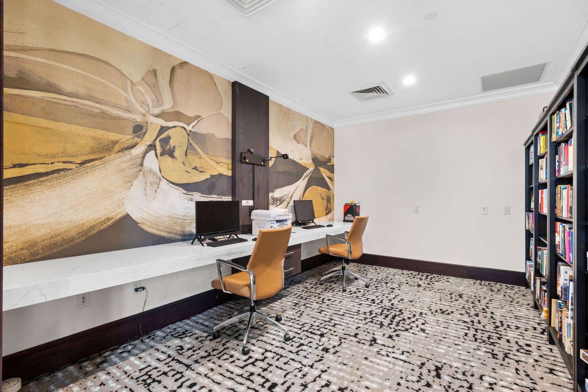610 W Las Olas Boulevard, #115N, Fort Lauderdale, FL 33312 Resident business center with workstations, built-in shelving & space for remote work or personal needs.
