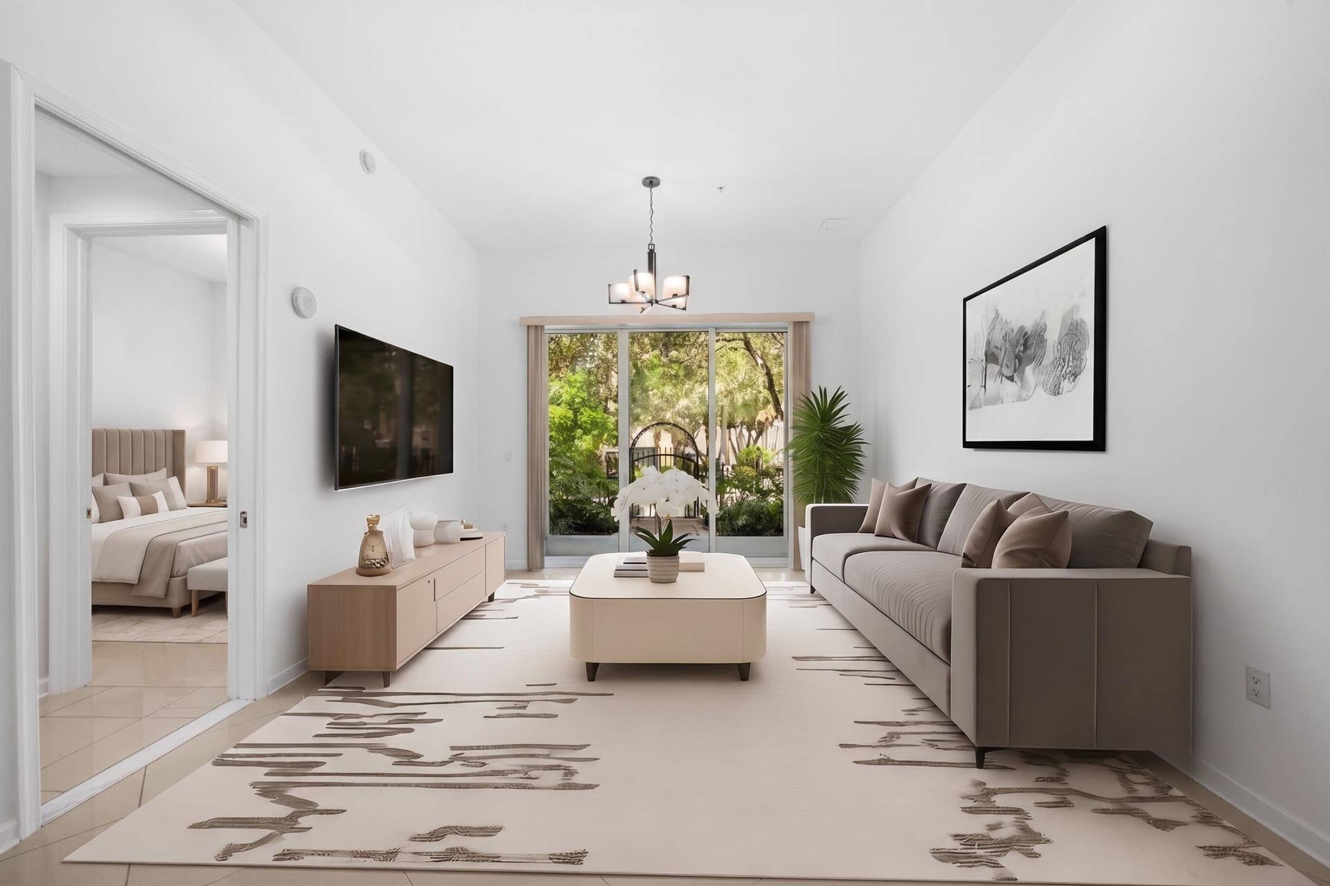 610 W Las Olas Boulevard, #115N, Fort Lauderdale, FL 33312 Living area highlighting soaring 11-foot ceilings, tile flooring throughout & sliding glass doors opening to the covered private patio.