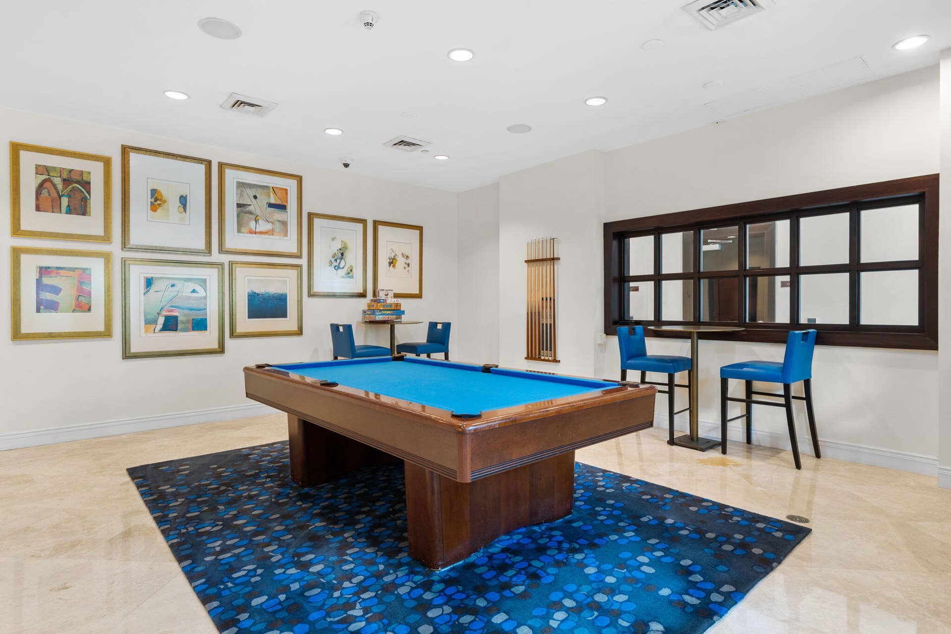 610 W Las Olas Boulevard, #115N, Fort Lauderdale, FL 33312 Resident club room with billiards, bar-height seating & a relaxed setting for entertaining or game nights.