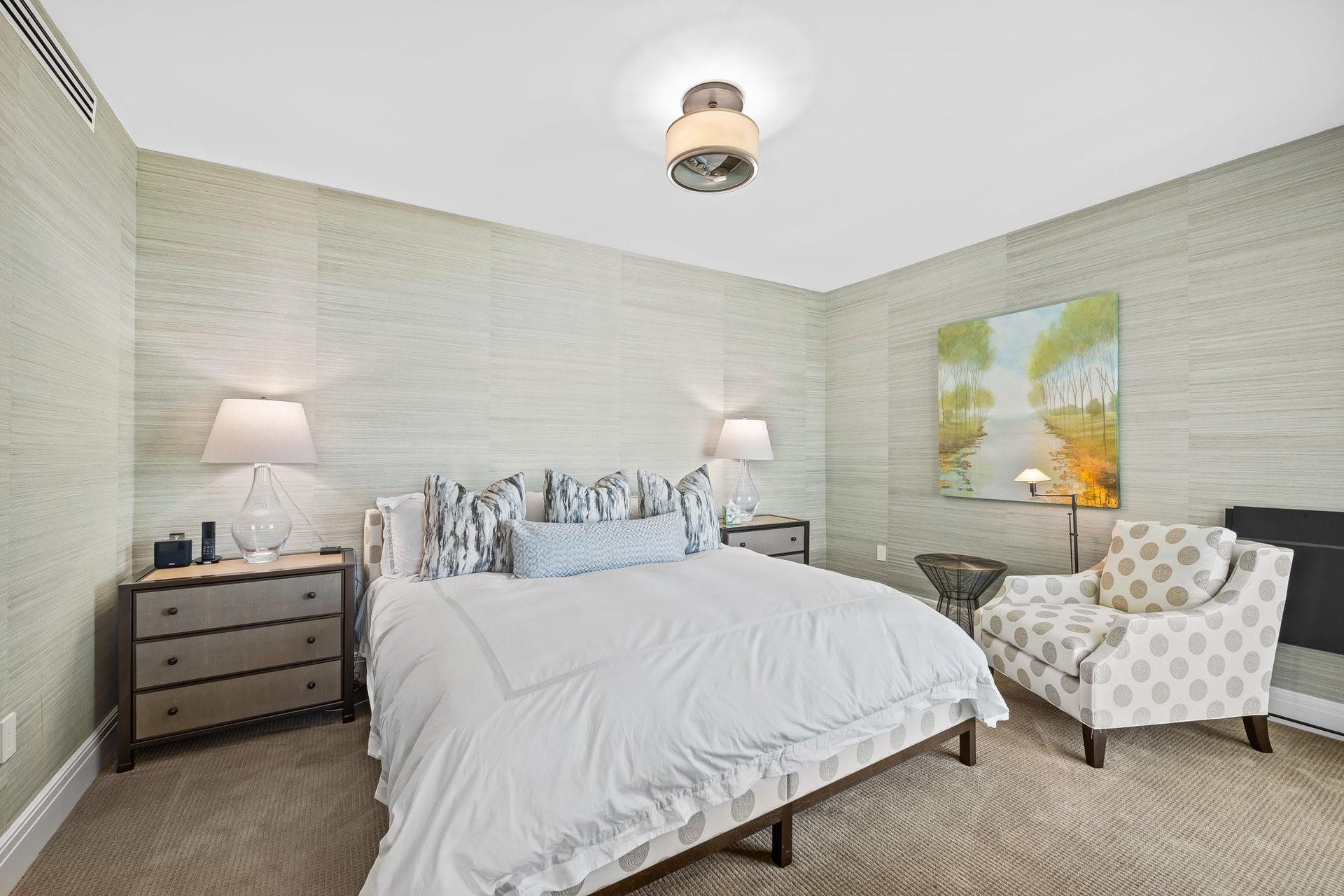3055 Harbor Drive, #1403, Fort Lauderdale, FL 33316 Bedroom featuring light-toned textured wall coverings, recessed air vent, and a ceiling-mounted light fixture