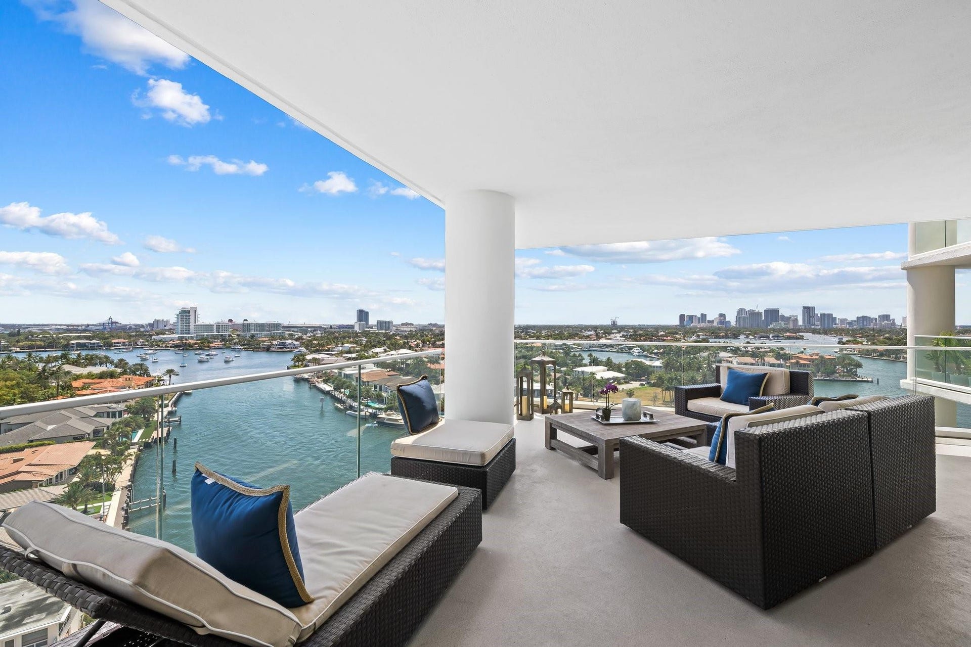 3055 Harbor Drive, #1403, Fort Lauderdale, FL 33316 Expansive outdoor terrace featuring a glass railing, smooth concrete flooring, and a wide-open overhead ceiling