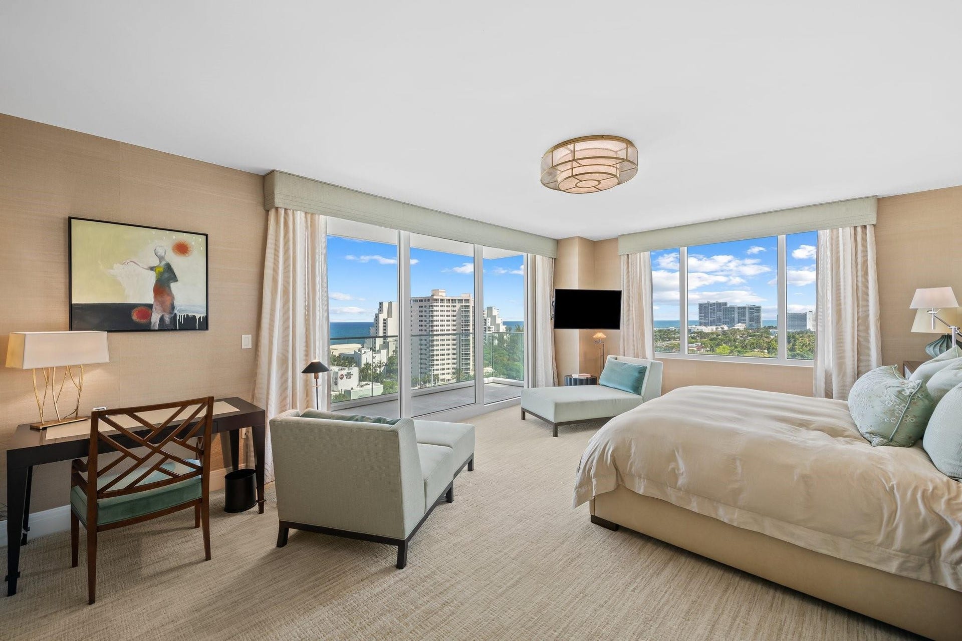 3055 Harbor Drive, #1403, Fort Lauderdale, FL 33316 Floor-to-ceiling windows featuring ocean and urban scenery