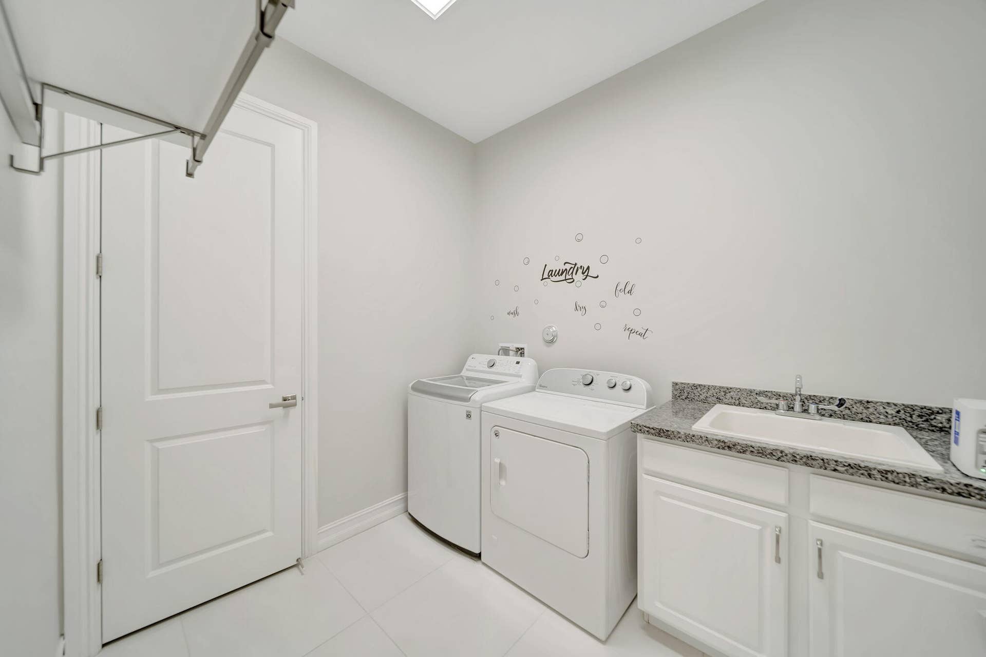 Even the Laundry Room has BUILT in closets for more storage!