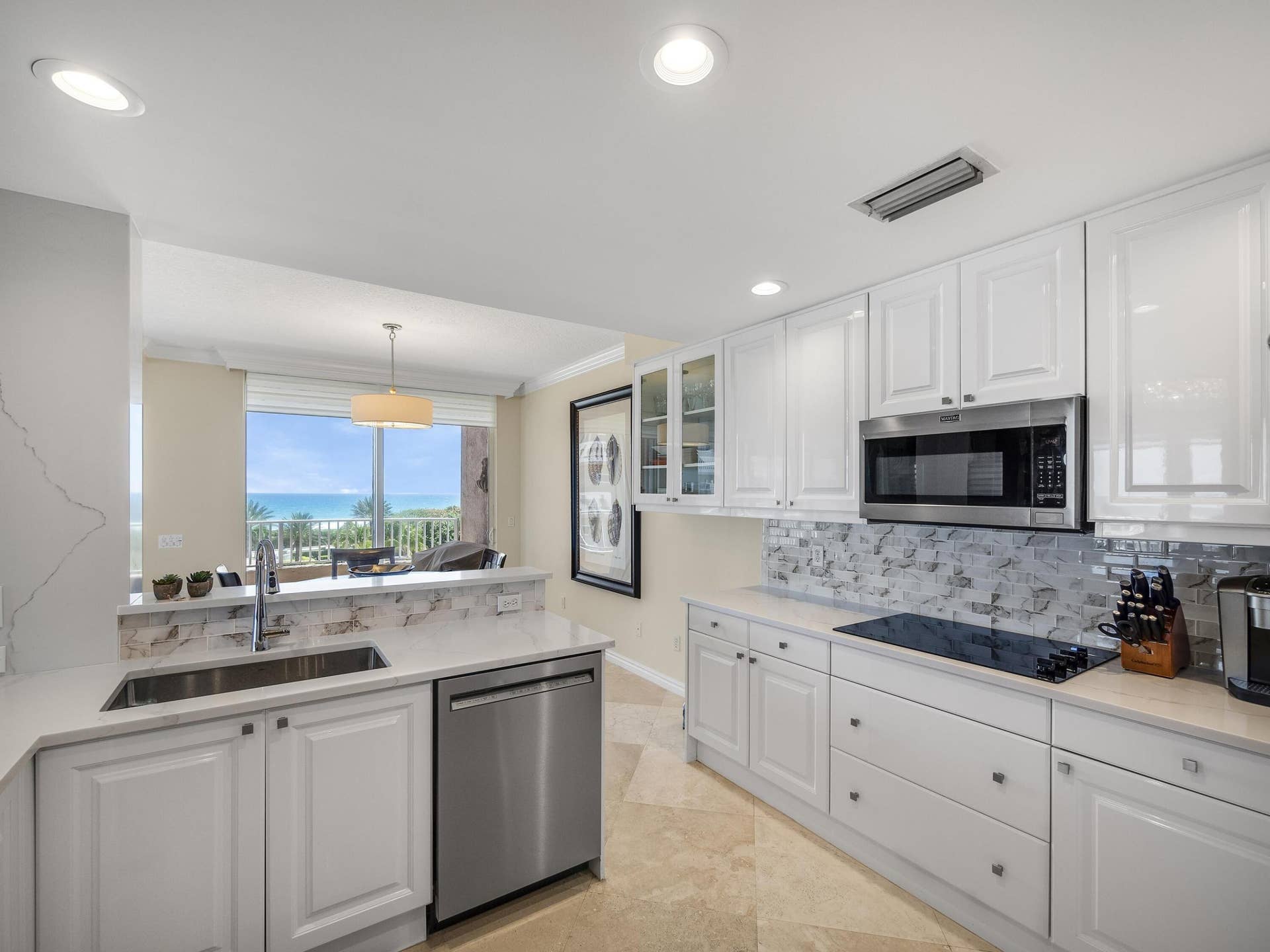 700 Ocean Royale, #401, Juno Beach, FL 33408 Updated Kitchen new backsplash countertops & appliances