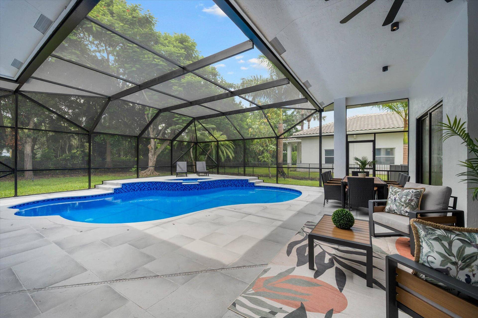 Resurfaced pool, screened-in patio with space to relax & play!